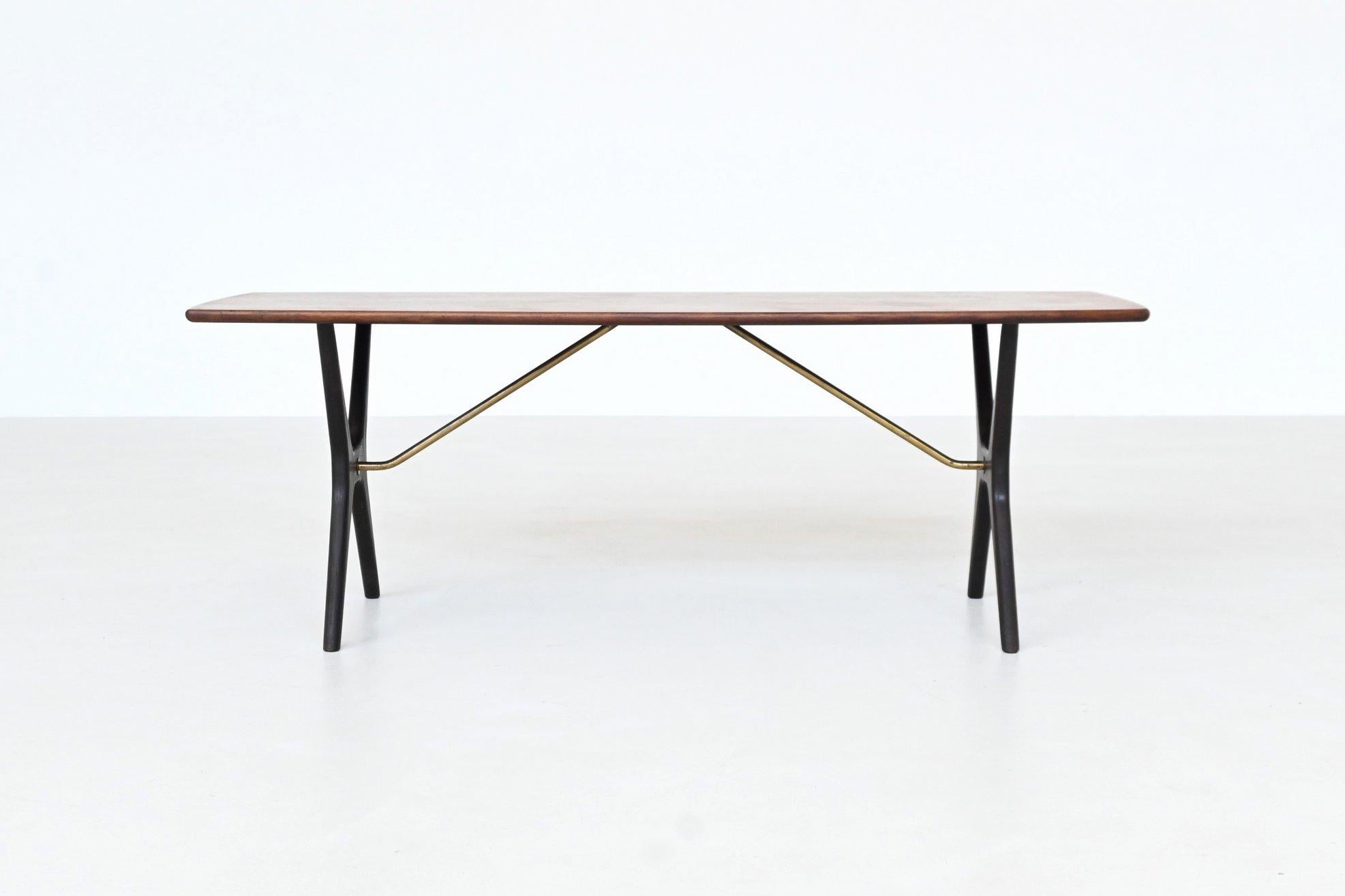 Striking coffee table designed by Karl Ekselius and produced by J.O. Carlsson (J.O.C.) in Sweden 1960. A superb example of Scandinavian craftsmanship and modernist sensibility, the table combines a sculptural frame with refined materiality.

The