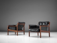 Karl-Erik Ekselius Black Leather and Teak Lounge Chairs