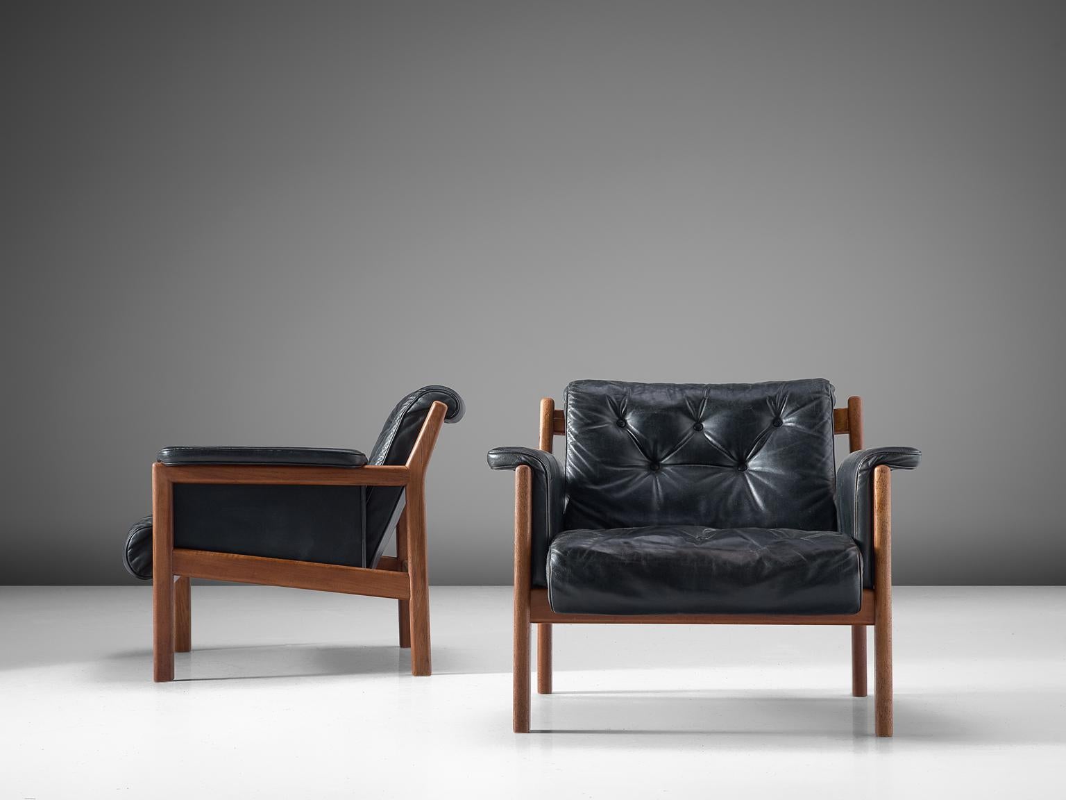 Swedish Karl-Erik Ekselius Black Leather and Teak Lounge Chairs