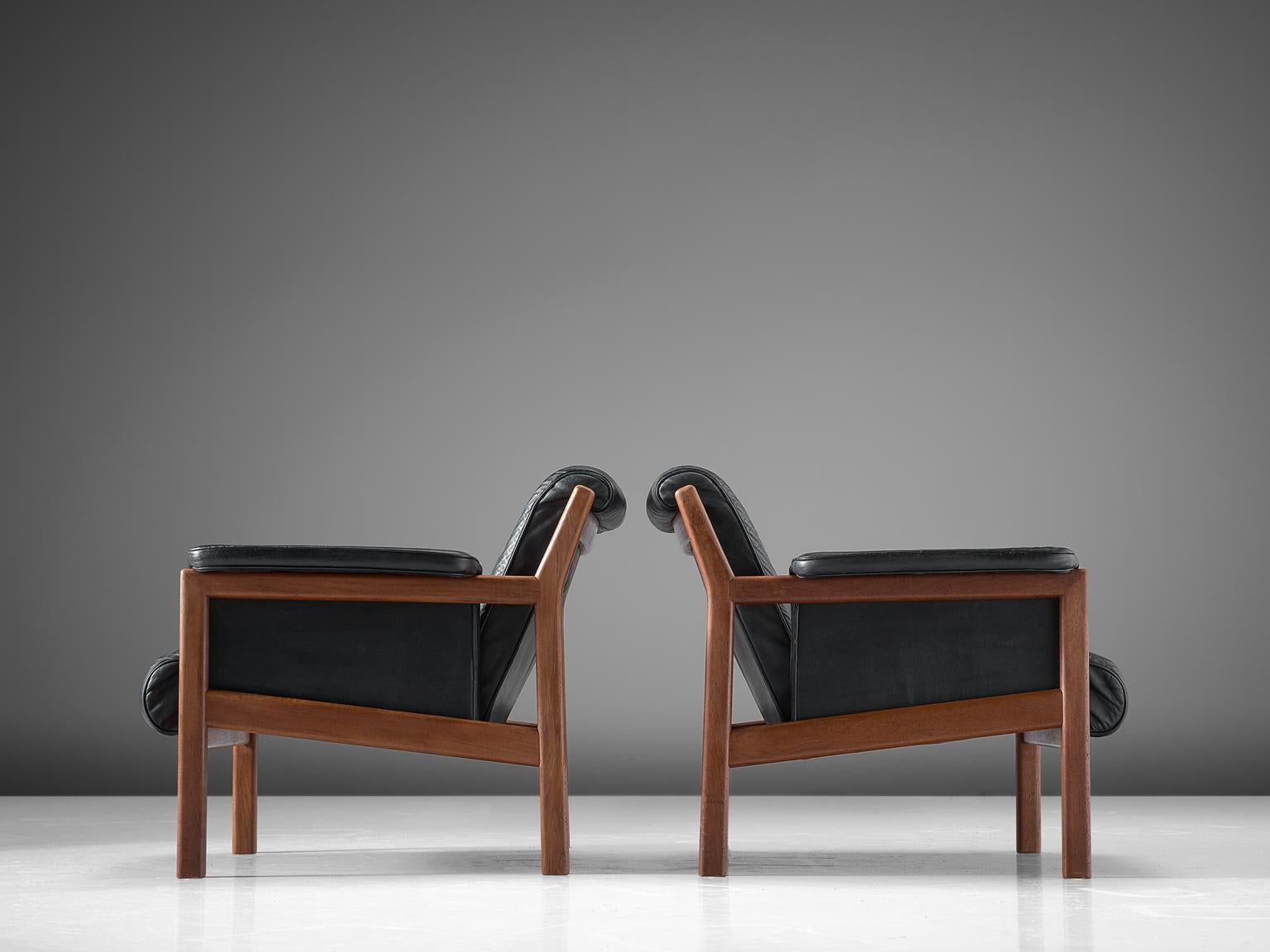 Mid-20th Century Karl-Erik Ekselius Black Leather and Teak Lounge Chairs