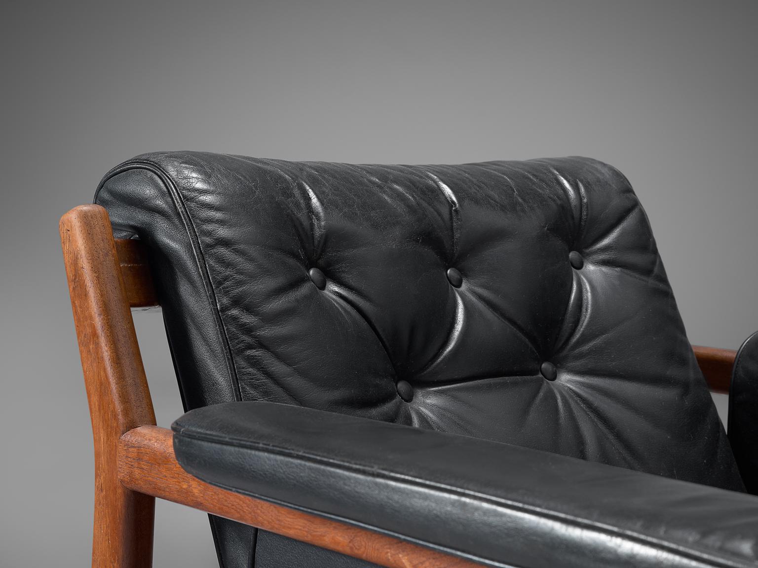 Karl-Erik Ekselius Black Leather and Teak Lounge Chairs 1