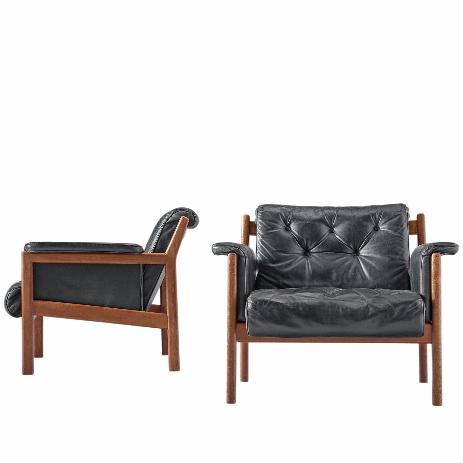 Karl-Erik Ekselius Black Leather and Teak Lounge Chairs