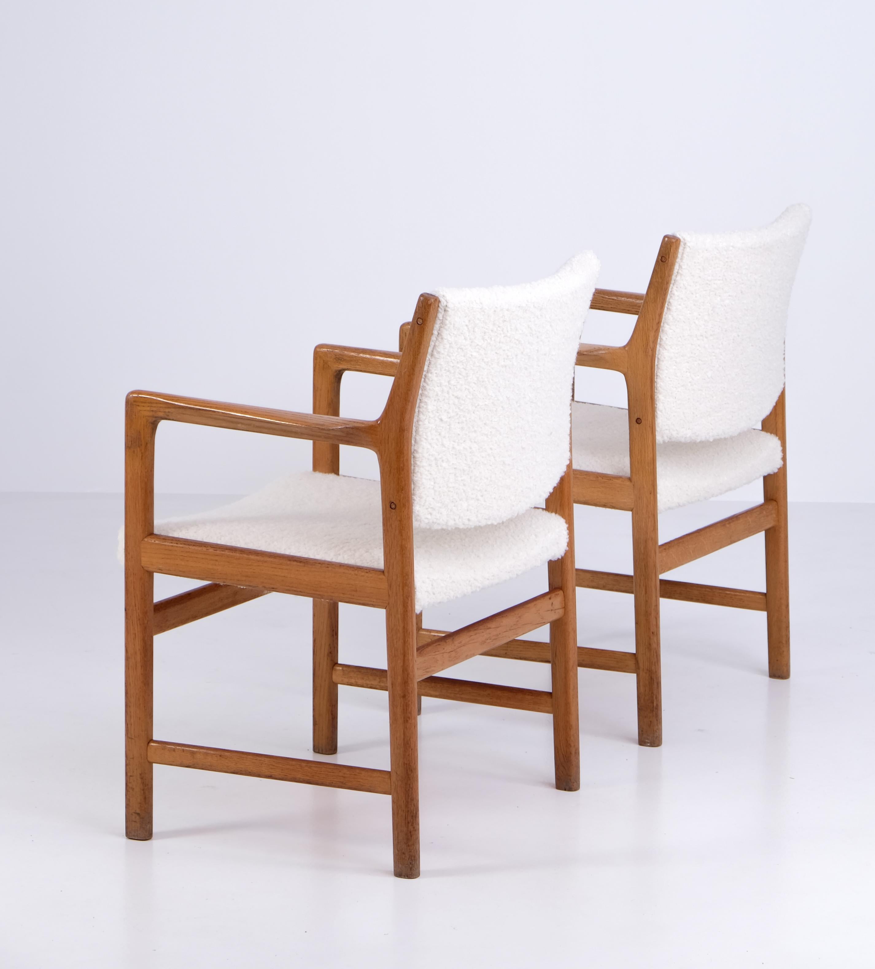 Armchairs designed by Karl-Erik Ekselius, produced by JOC in Vetlanda, Sweden, 1960s.
Solid oak frame and newly upholstered cushions.
Set of 10 chairs available. Listed price is for a pair.
 