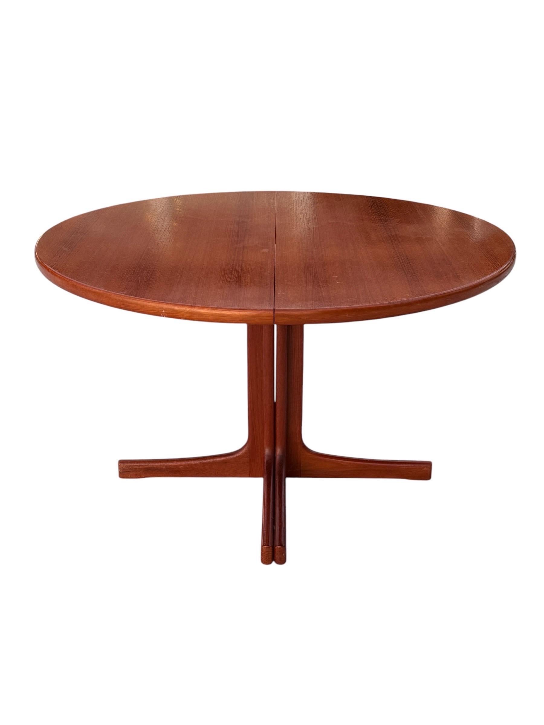 Karl-Erik Ekselius for JOC Møbler Teak Dining Table

A stunning example of Scandinavian design, this teak dining table by Karl-Erik Ekselius transitions seamlessly from a 47-inch round top to a 94-inch oval with two 23¾-inch leaves. The elegant
