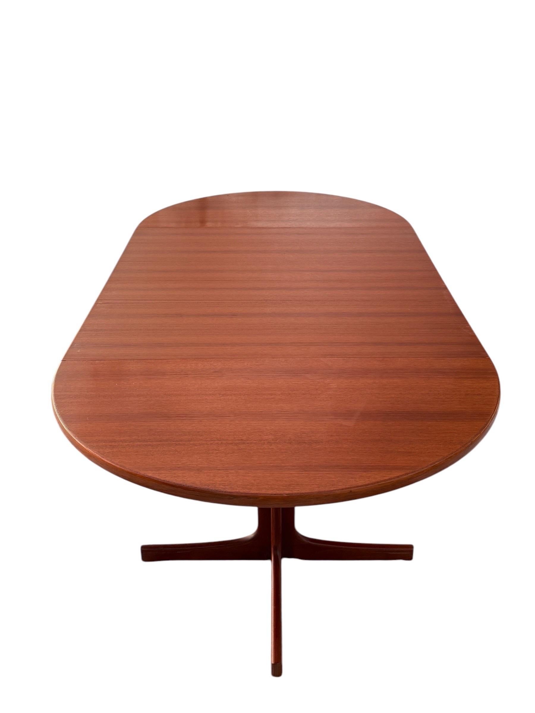 Karl-Erik Ekselius for JOC Møbler Round to Oval Teak Dining Table In Good Condition In Brooklyn, NY