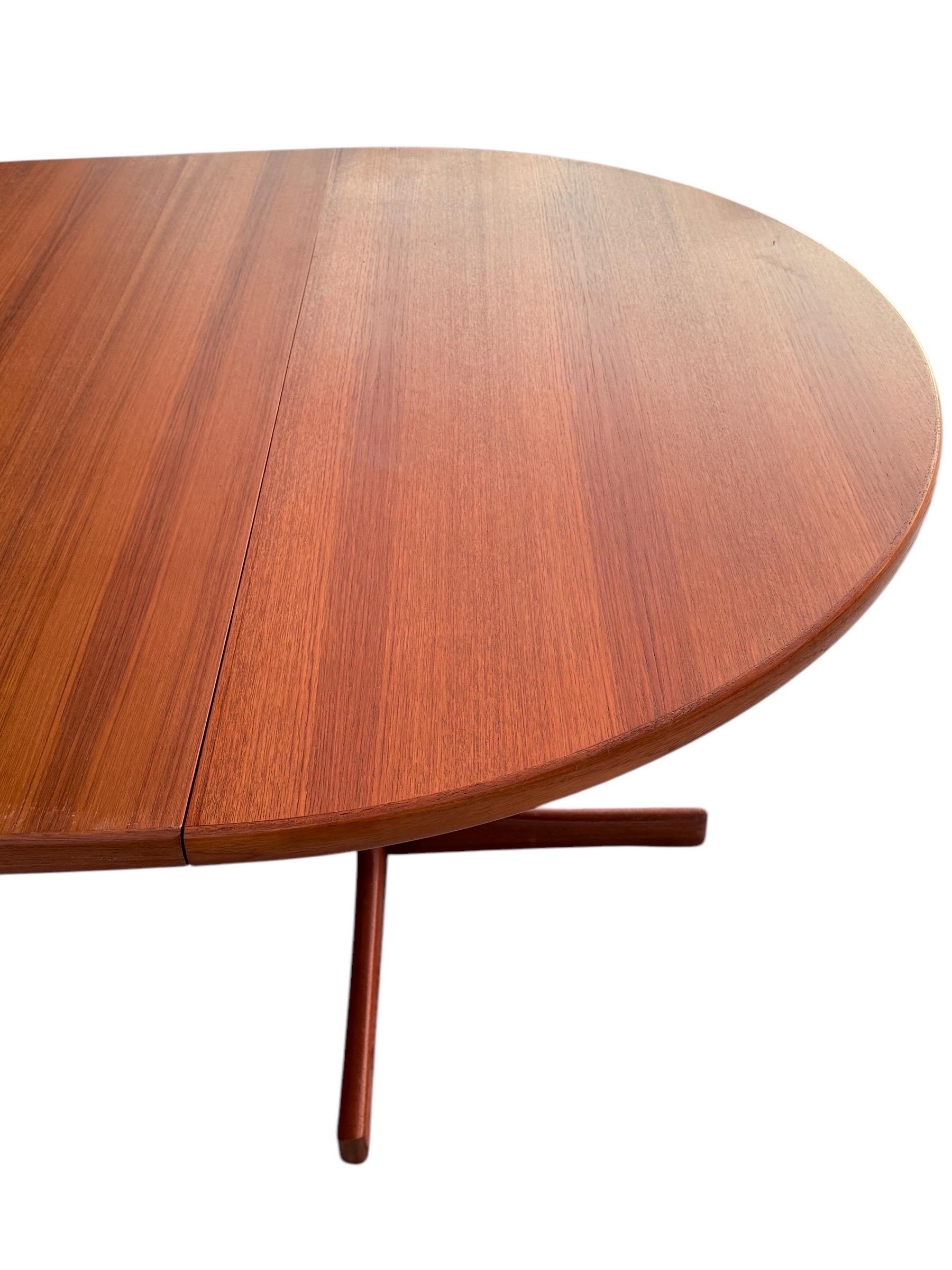 Karl-Erik Ekselius for JOC Møbler Round to Oval Teak Dining Table 1