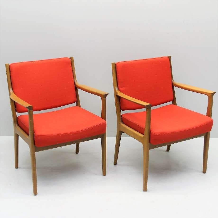 Karl Erik Ekselius Mid Century Armchairs. A pair of matching Scandinavian Modern armchairs by famed Swedish designer Karl Erik Ekselius (one of two pairs, see item #517783). Solid oak frame and original upholstery in wonderful vintage
