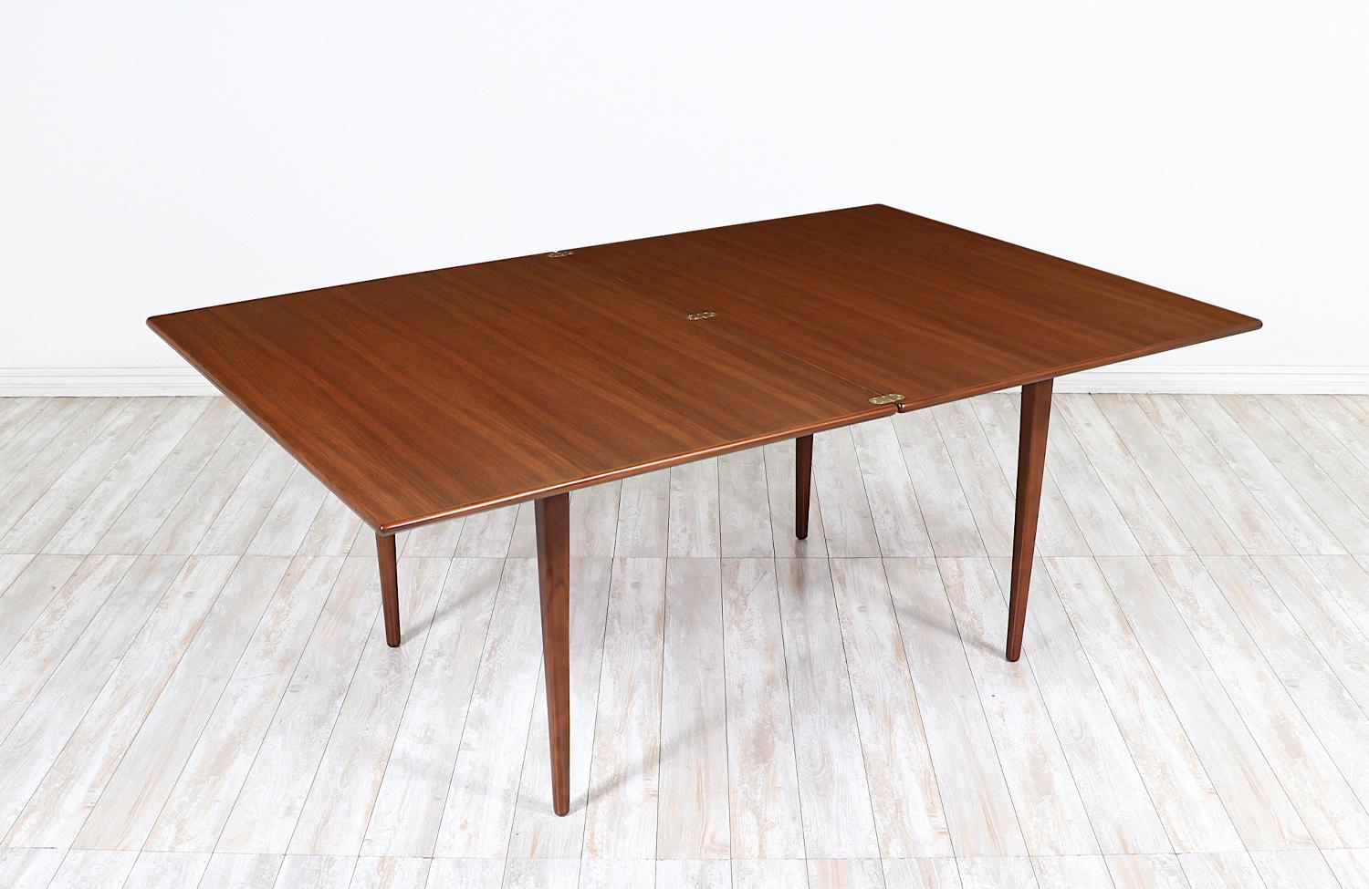 Karl-Erik Ekselius Model-1401 expanding walnut dining table for Dux.

Dimensions
29.25in H x 36in - 72in W x 47.50in D  
Extension Leaf 36in
 
______________________________________________________________

Transforming a piece of Mid-Century Modern