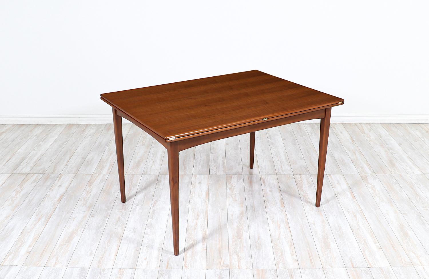 Mid-Century Modern  Expertly Restored - Karl-Erik Ekselius Expanding Walnut Dining Table for DUX For Sale