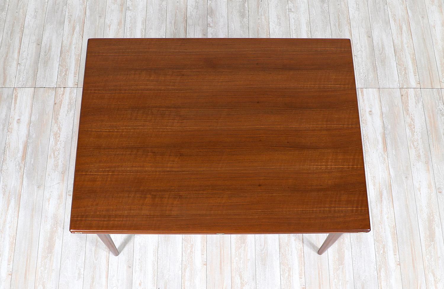 Mid-20th Century  Expertly Restored - Karl-Erik Ekselius Expanding Walnut Dining Table for DUX For Sale