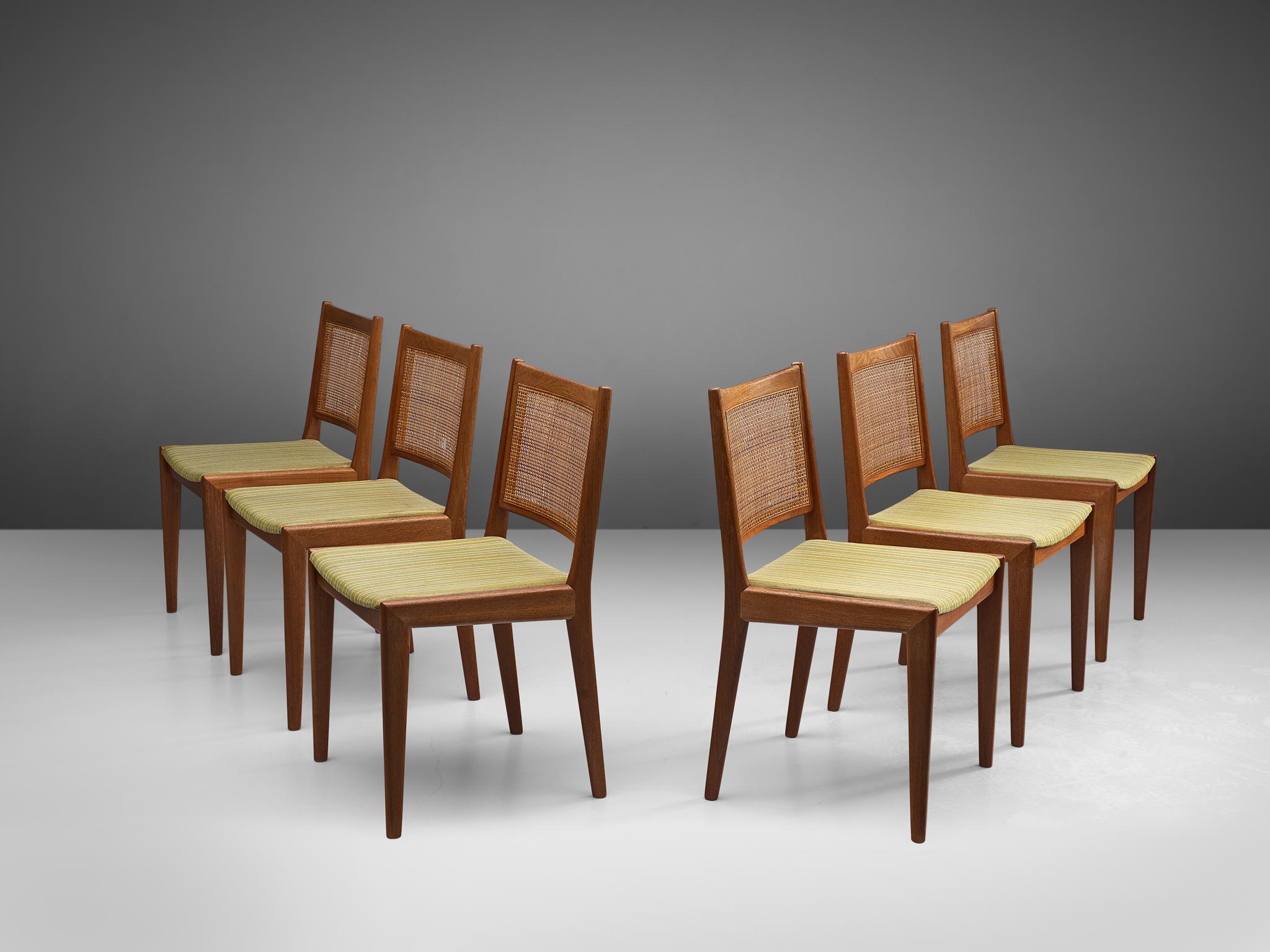 Karl-Erik Ekselius for J.O. Carlsson, set of 6 dining chairs, teak, cane , Denmark, 1950s

This stately set of six chairs with teak frame has a profiled back with woven cane and a green to white seat with striped upholstery. This set is designed by