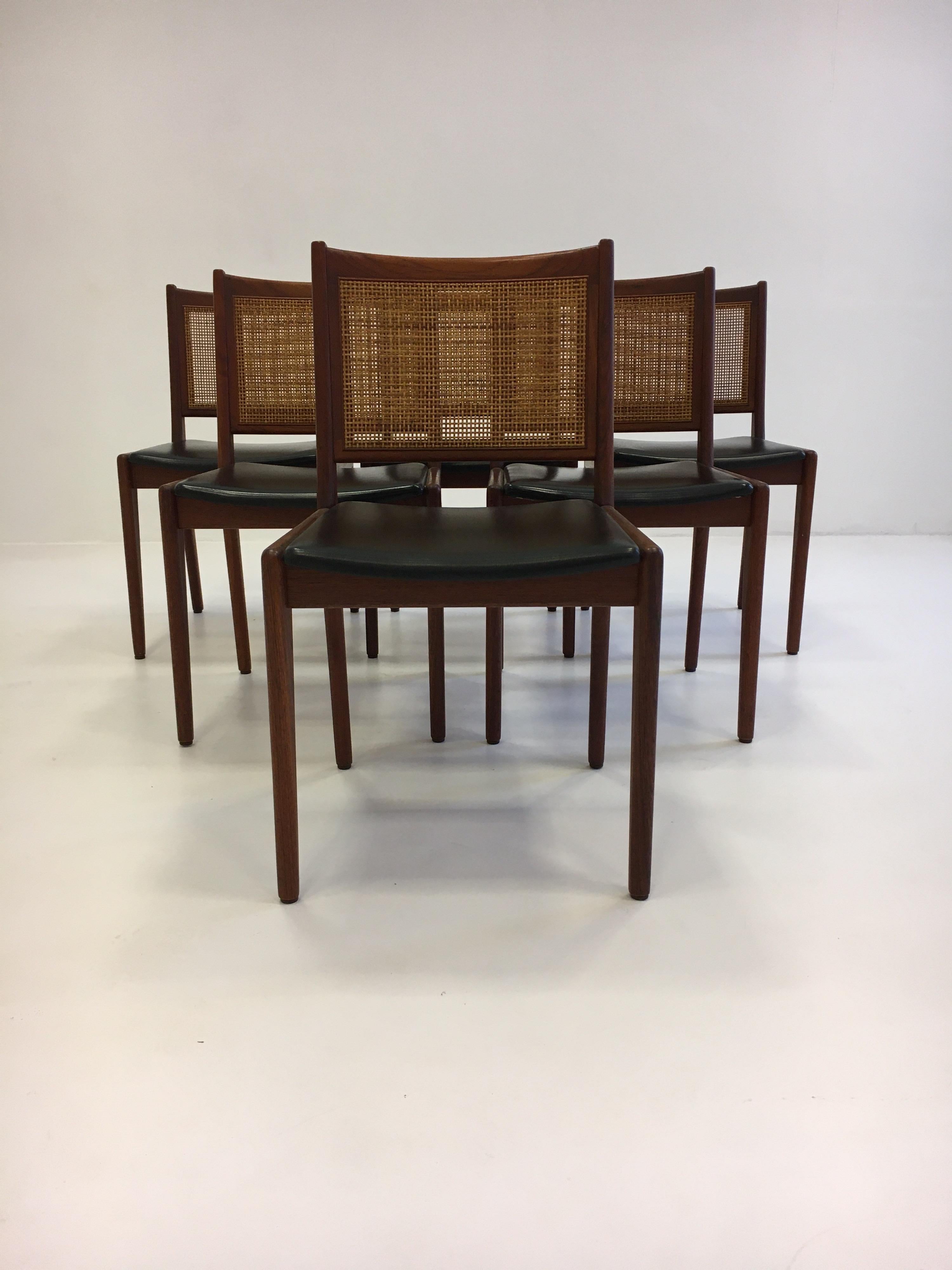Karl-Erik Ekselius set of six dining chairs in teak and cane, Sweden, 1950s. This set is designed by Karl-Erik Ekselius, which show influences of both Scandinavian and French modern design.