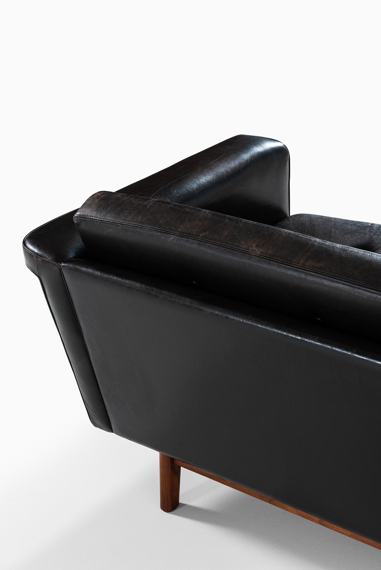 Karl-Erik Ekselius sofa in black leather by JOC in Sweden 1