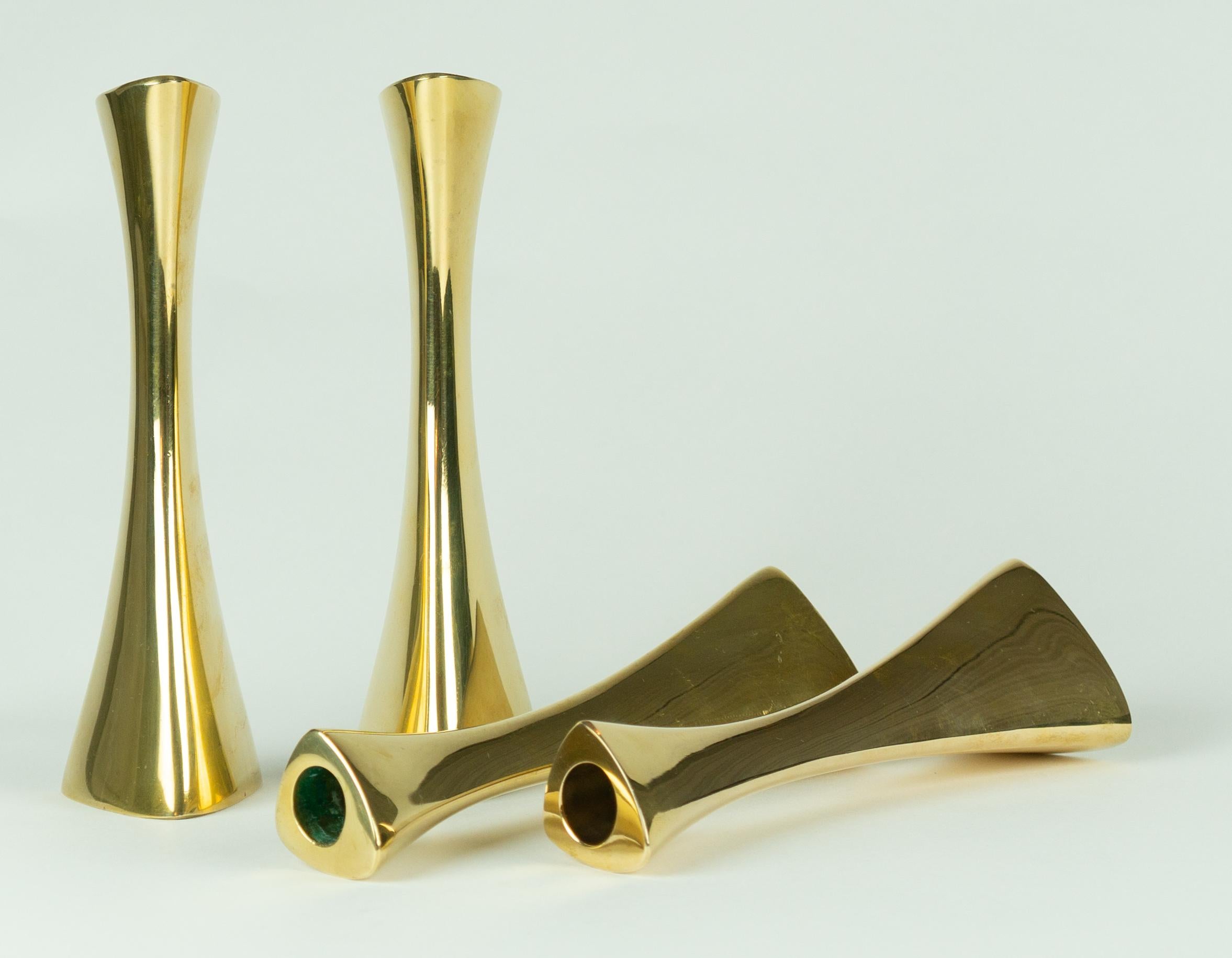 Cast Karl-Erik Ytterberg, Set of Four Brass Candlesticks, Sweden, 1960s