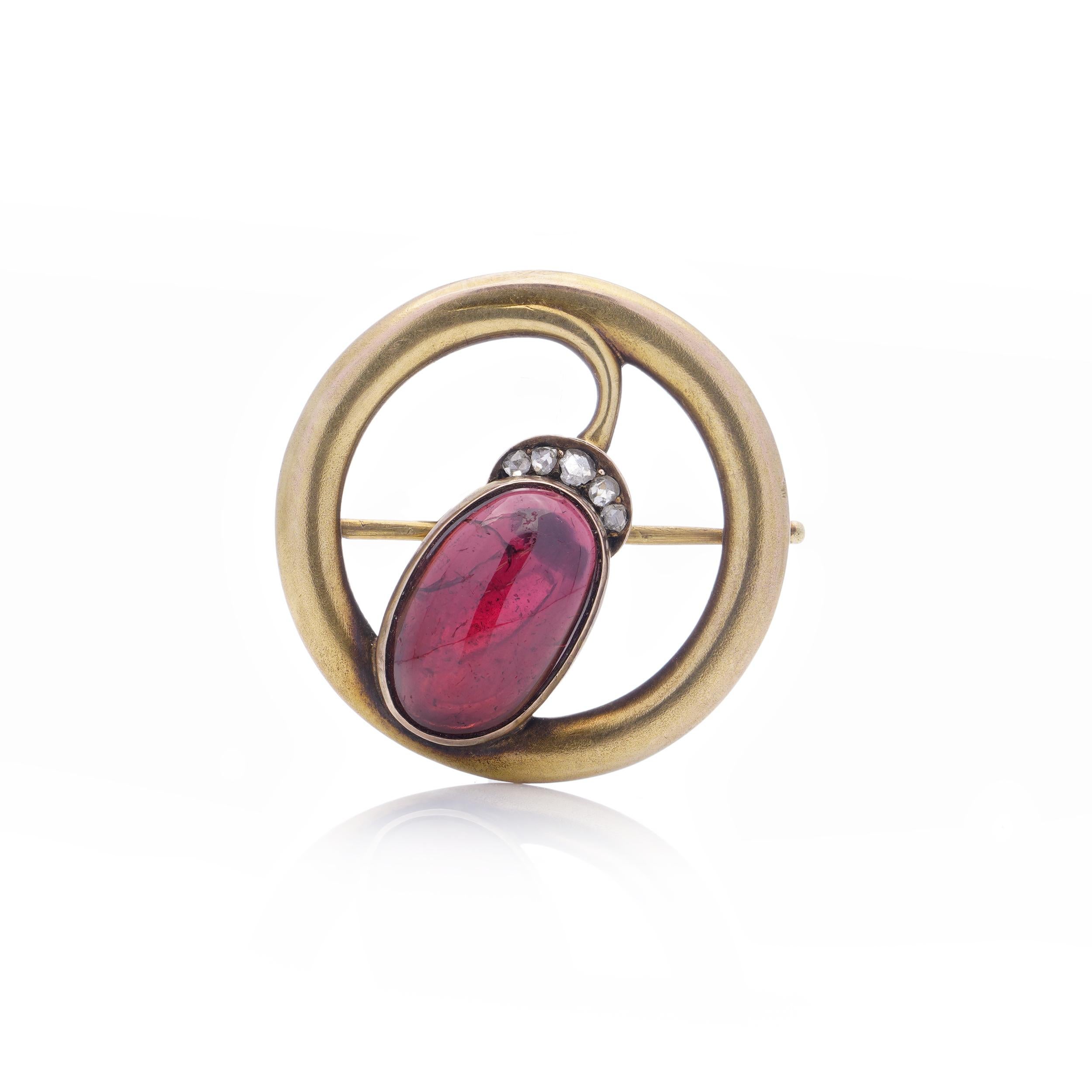 Karl Faberge 14kt yellow gold oval cabochon amethyst and rose - cut diamond brooch.

This exquisite circular brooch, crafted in 14-karat matte gold, embodies the opulence and artistry synonymous with Russian jewellery design. 

The reverse side of