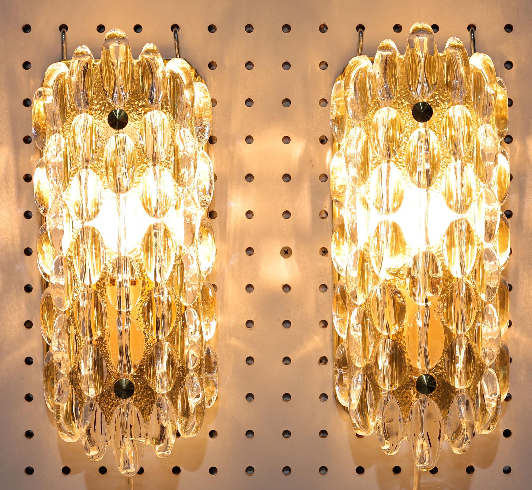 A pair of thick crystal bubble lamps designed by Karl Fagerland for Orrefors, 1950s.