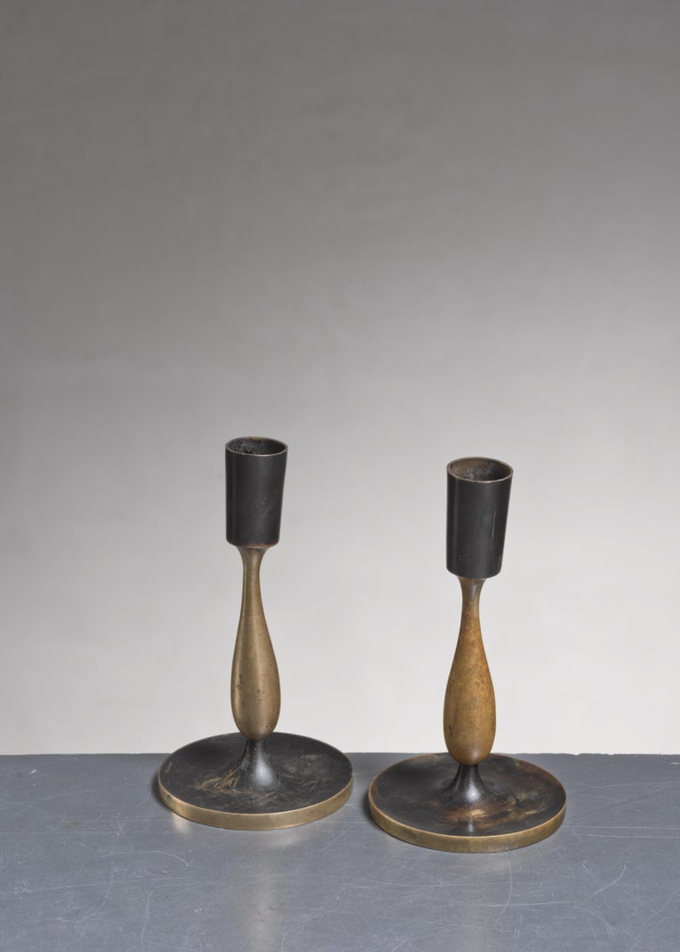 A pair of small, sculptural brass candlesticks by Karl Hagenauer, Vienna.
Marked by Karl Hagenauer underneath.