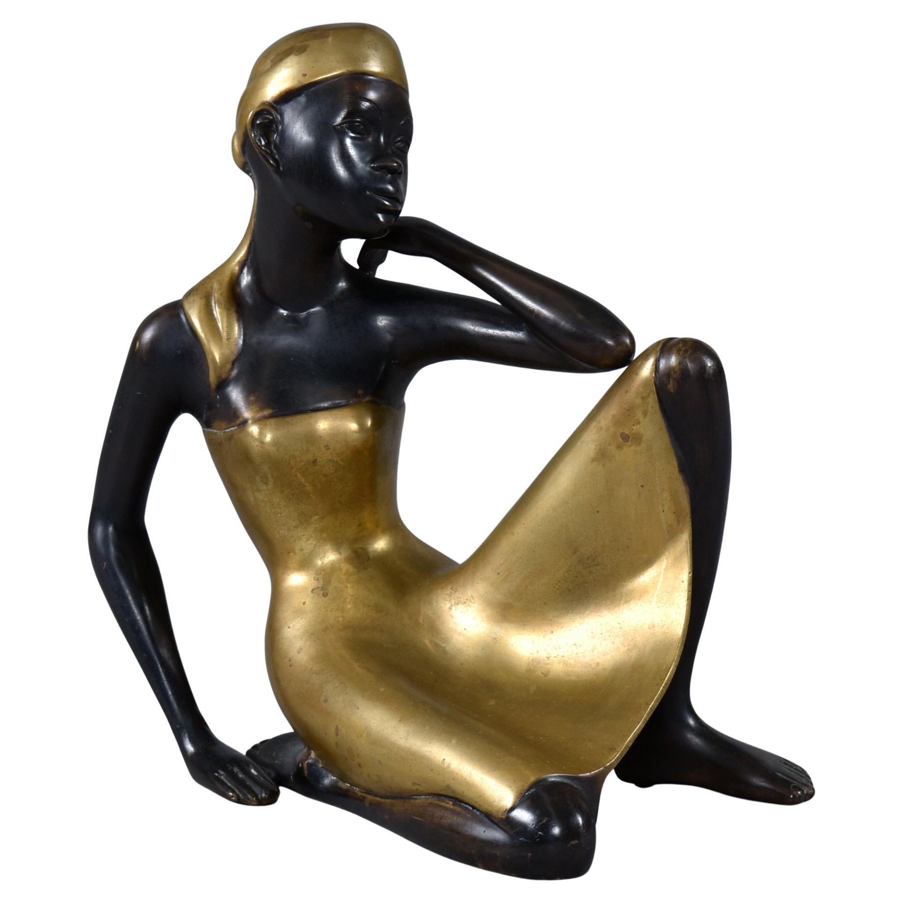 Scultura in bronzo di donna africana seduta in stile Karl Hagenauer