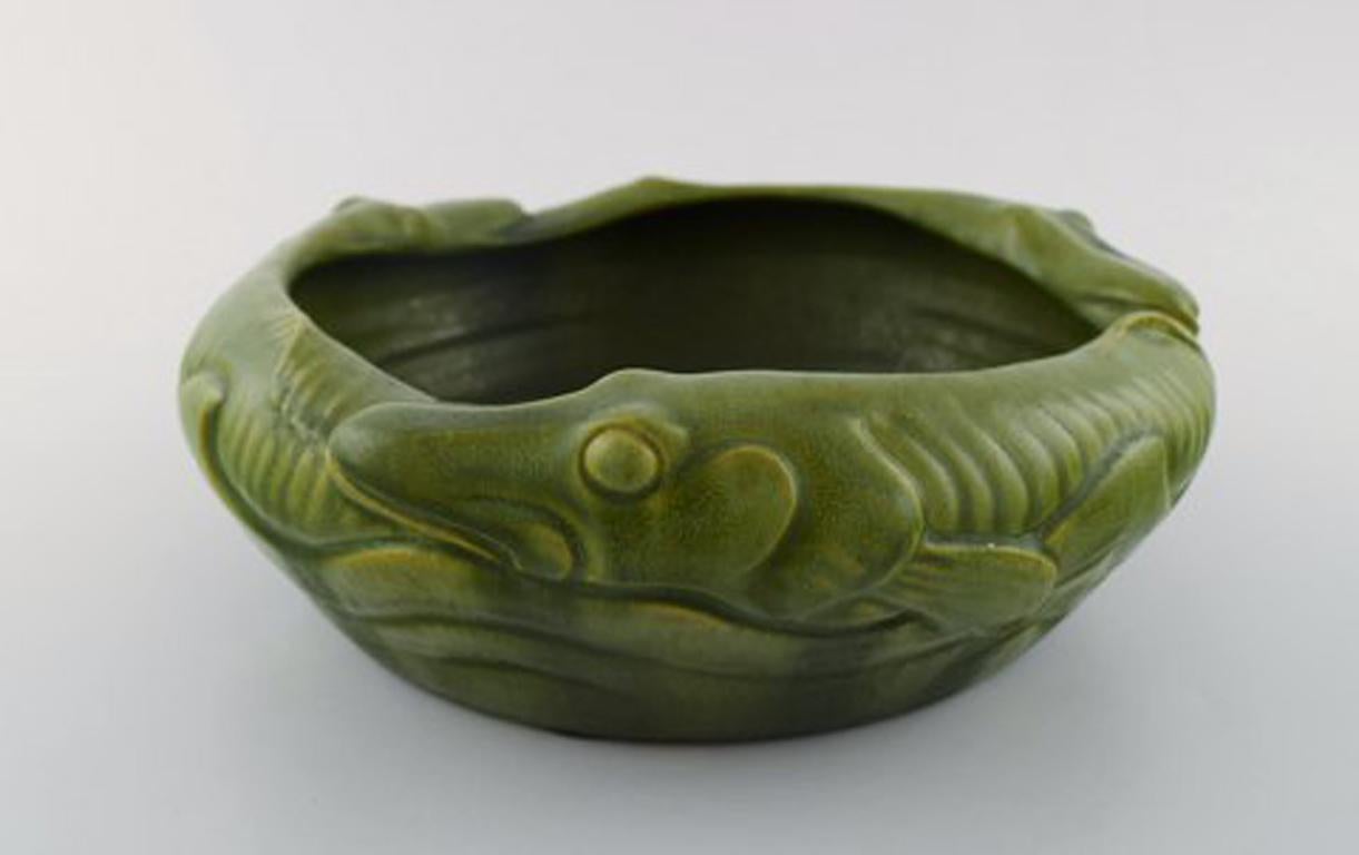 Karl Hansen Reistrup for Kähler, bowl with pikes. Beautiful green glaze. Early 1900s.
In very good condition.
Measures 27 cm x 8.5 cm.
Marked.