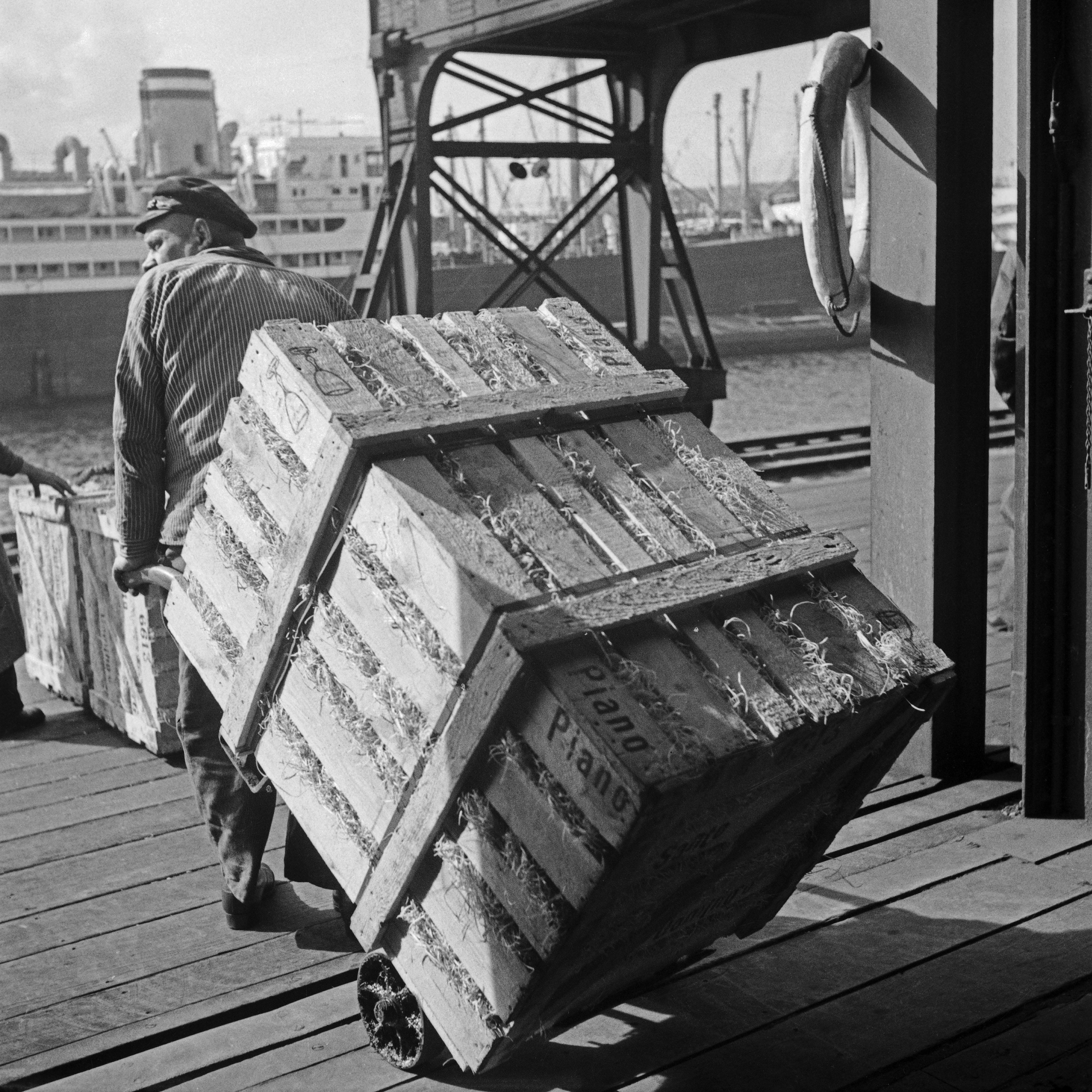 Karl Heinrich Lämmel Black and White Photograph - A worker at Hamburg harbor, Germany 1937, Printed Later 