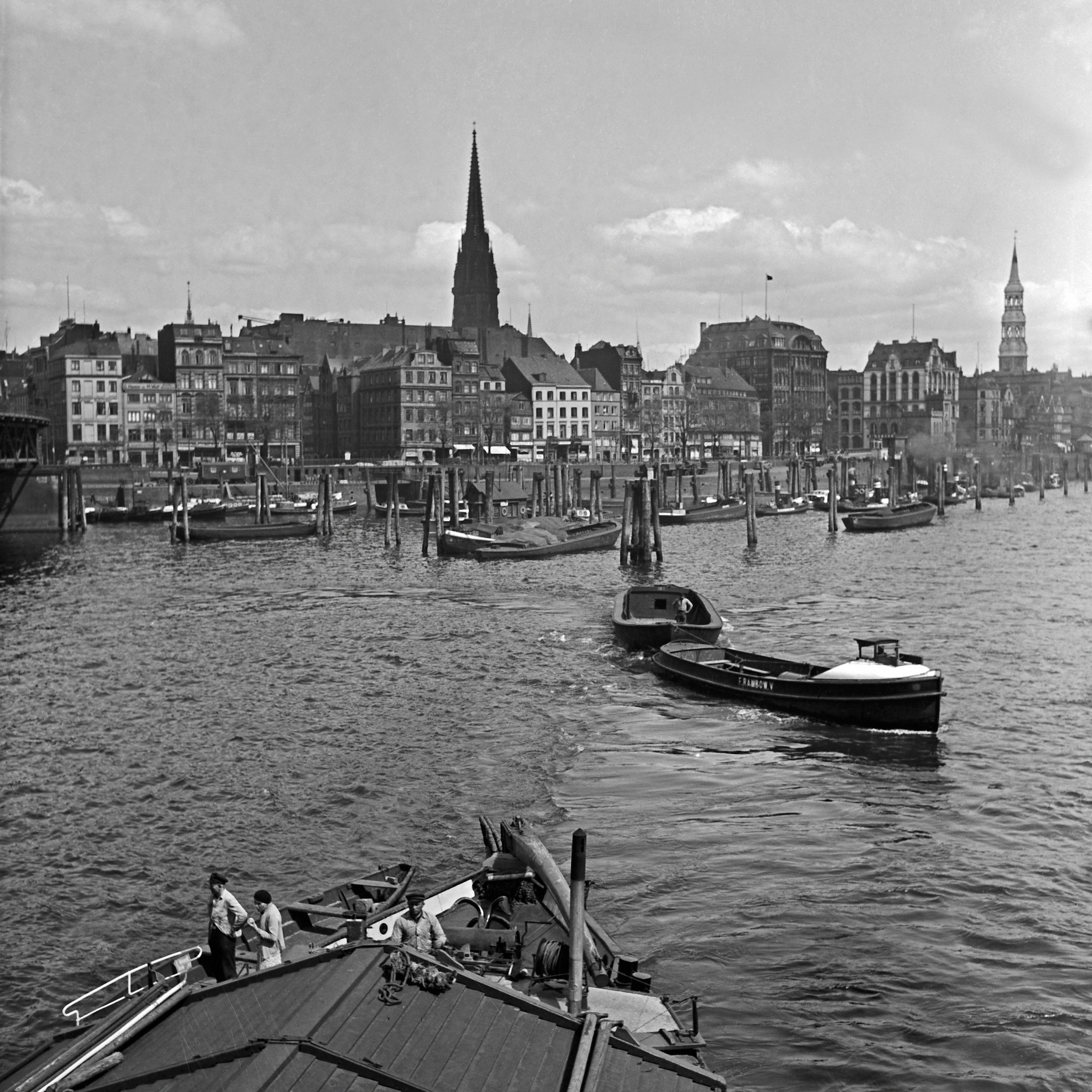 Karl Heinrich Lämmel Black and White Photograph - Barges boats at Hamburg harbor to St. Nicolas church Germany 1938 Printed Later 