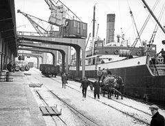 Cargo quay near the bridge at the harbor, Germany 1934 Printed Later 