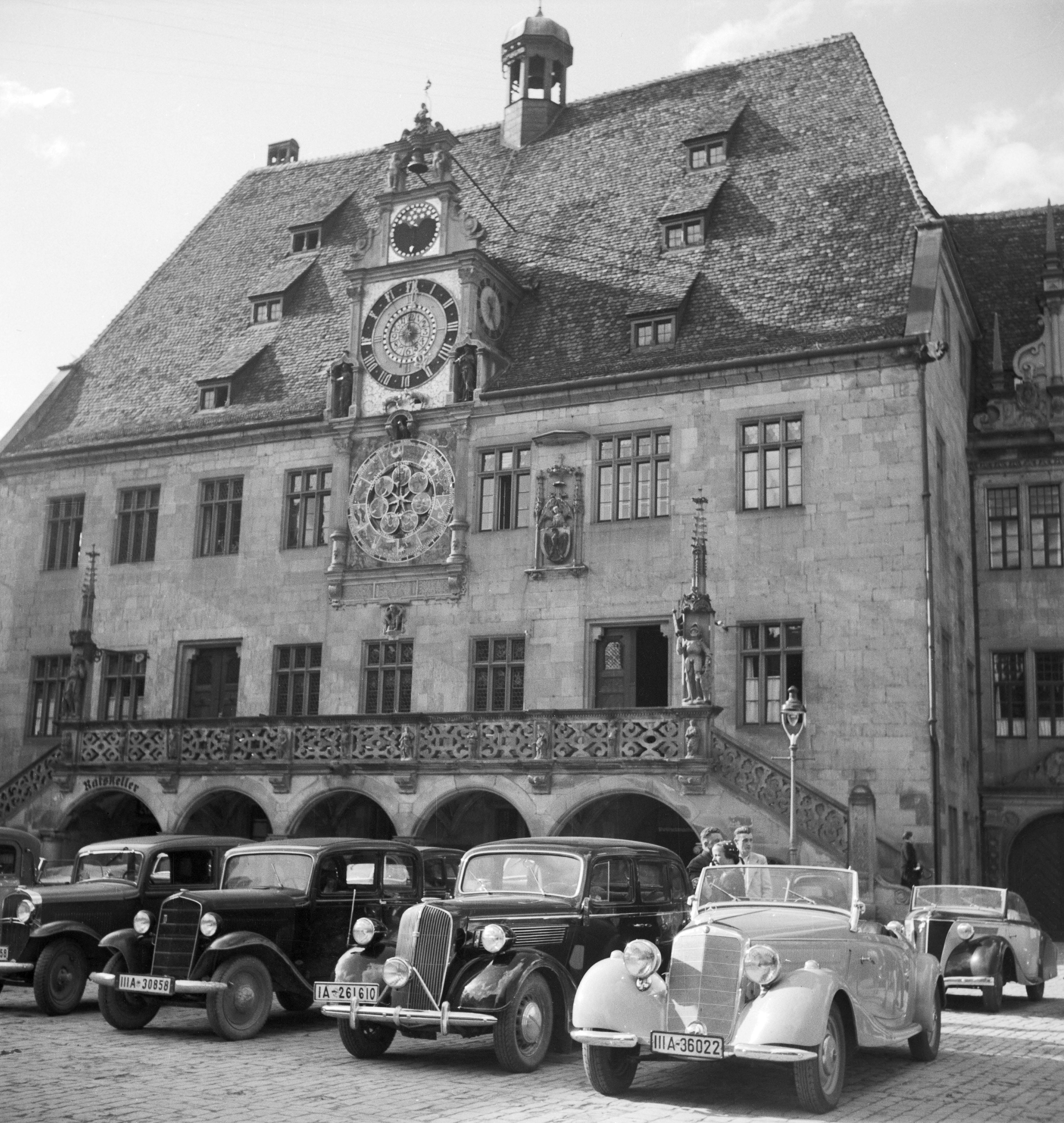 Karl Heinrich Lämmel Black and White Photograph - Cars parking at old Heidelberg city hall, Germany 1936, Printed Later 