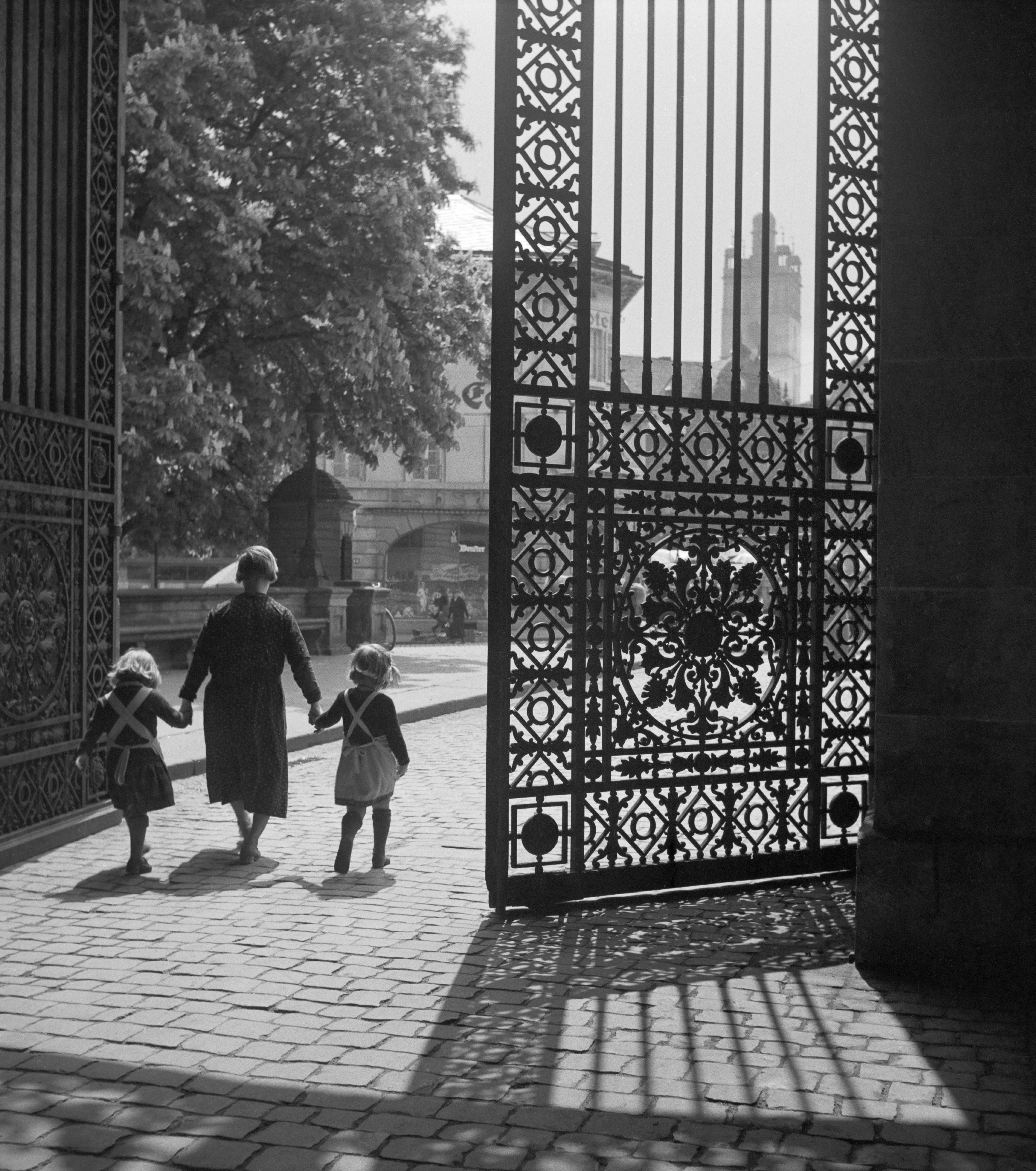 Karl Heinrich Lämmel Black and White Photograph - Entrance gate Darmstadt castle girls and woman, Germany 1938 Printed Later