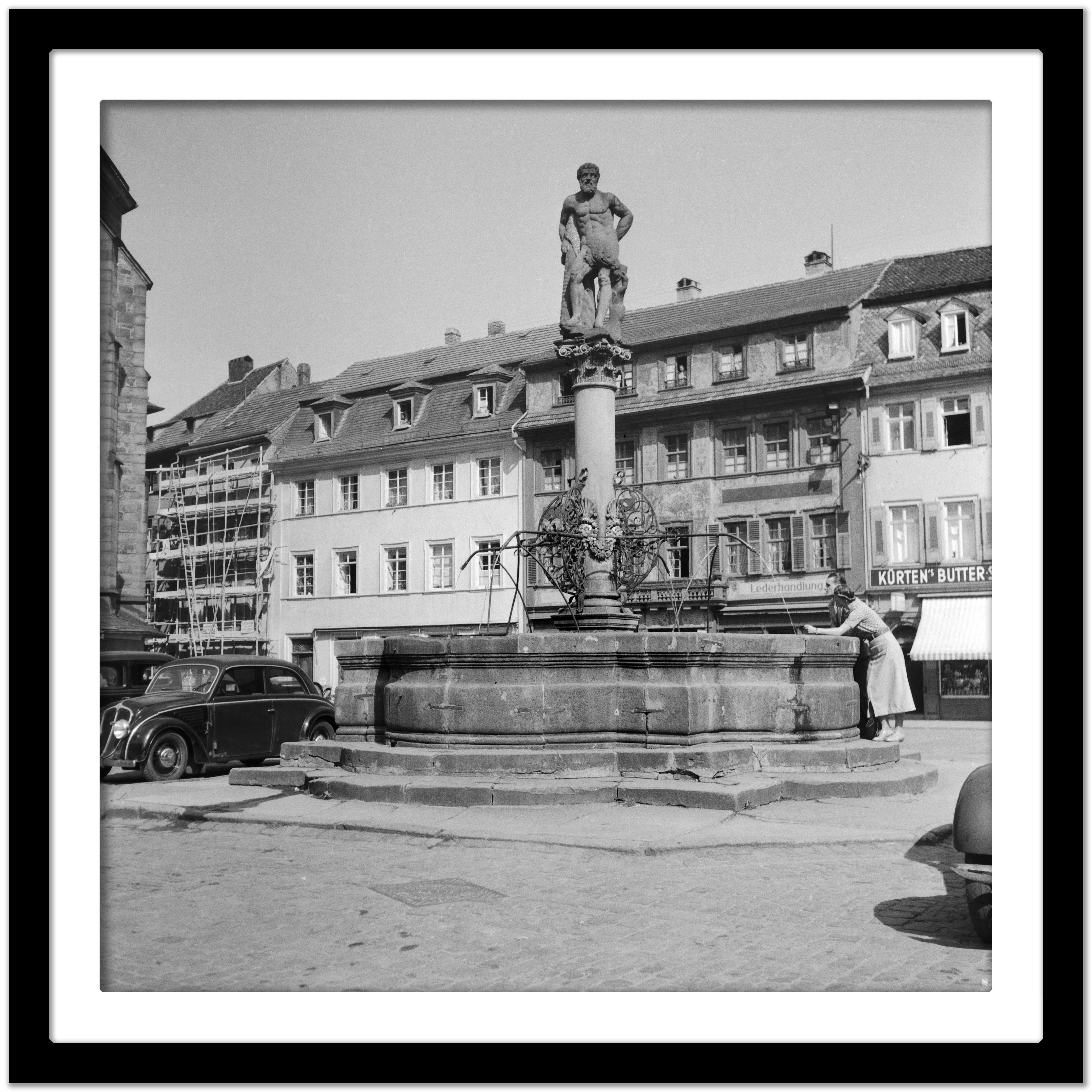 Fountain behind Heiliggeist church Heidelberg, Germany 1936, Printed Later  - Gray Black and White Photograph by Karl Heinrich Lämmel