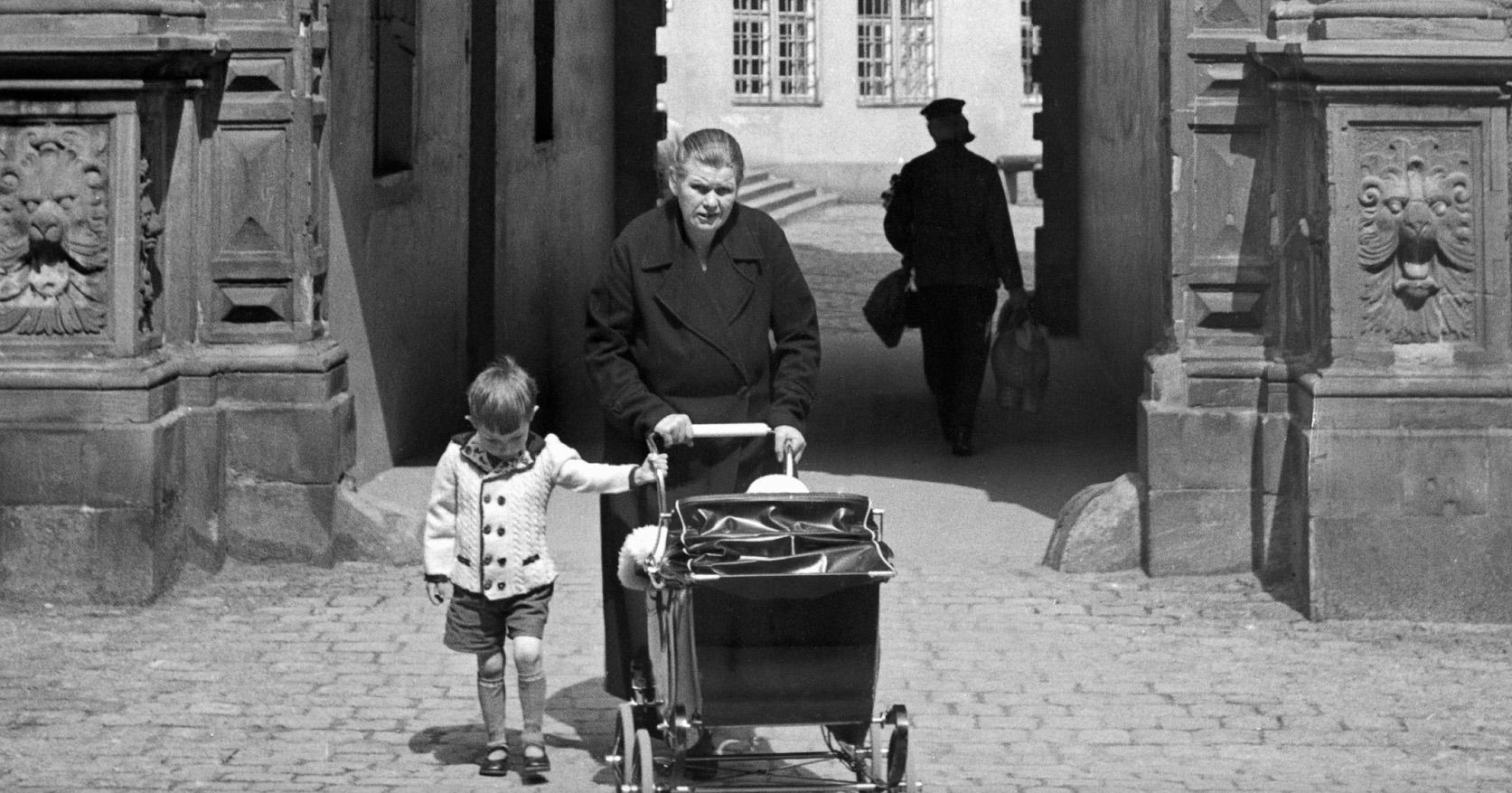 Gate Darmstadt castle granny grandchild stroller, Germany 1938 Printed Later  - Photograph by Karl Heinrich Lämmel