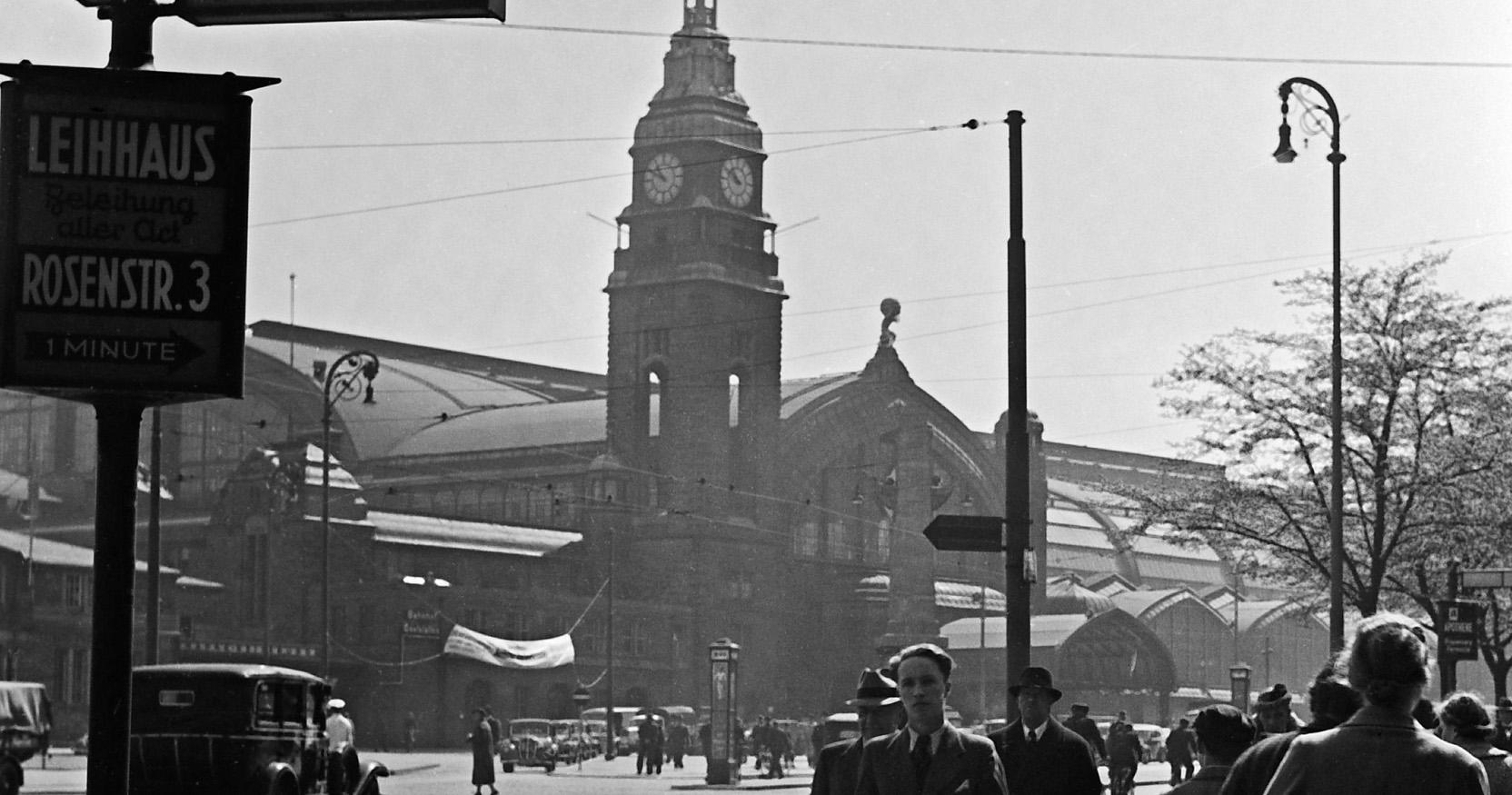 Hamburg main station with passers by, Germany 1938, Printed Later  - Photograph by Karl Heinrich Lämmel