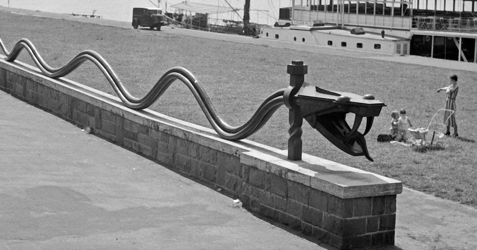 Rhine snake sculpture at shore of Rhine Duesseldorf, Germany 1937 Printed Later  - Photograph by Karl Heinrich Lämmel