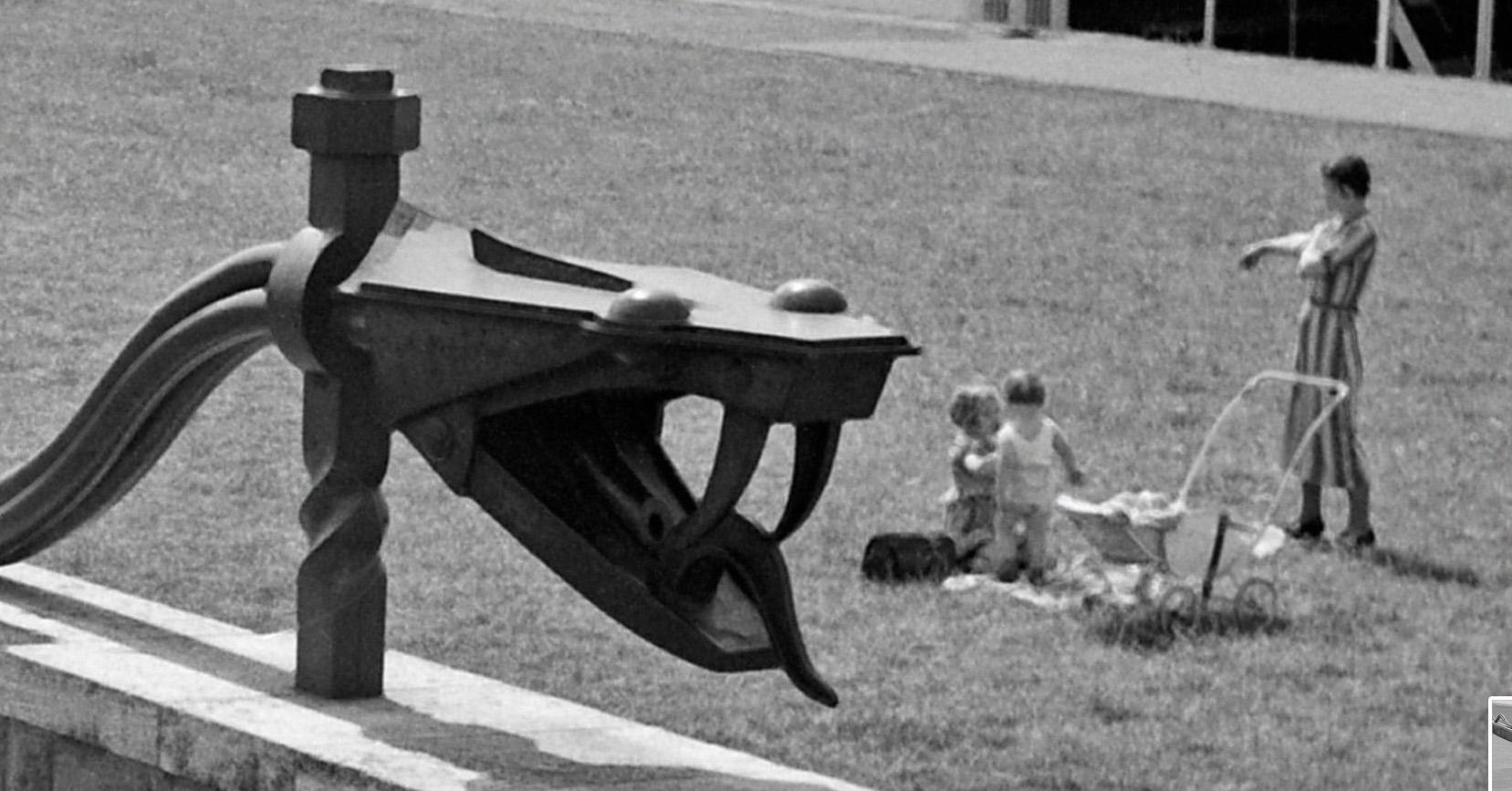 Rhine snake sculpture at shore of Rhine Duesseldorf, Germany 1937 Printed Later  - Modern Photograph by Karl Heinrich Lämmel