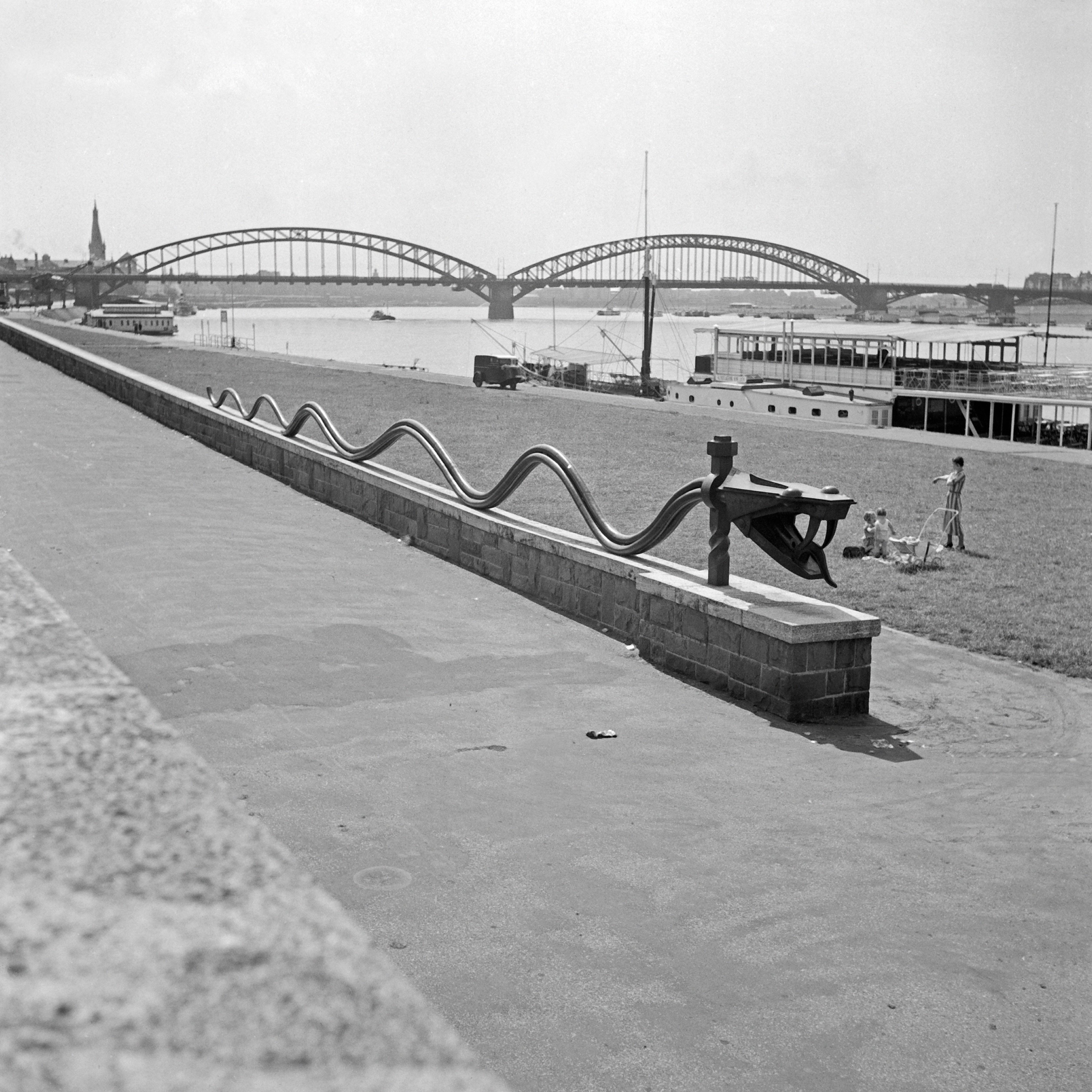 Karl Heinrich Lämmel Black and White Photograph - Rhine snake sculpture at shore of Rhine Duesseldorf, Germany 1937 Printed Later 