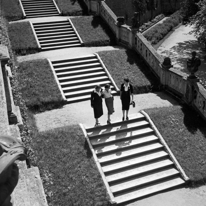 Karl Heinrich Lämmel Landscape Photograph - Three women at the stairs in the public, 1930 Limited ΣYMO Edition, Copy 1 of 50