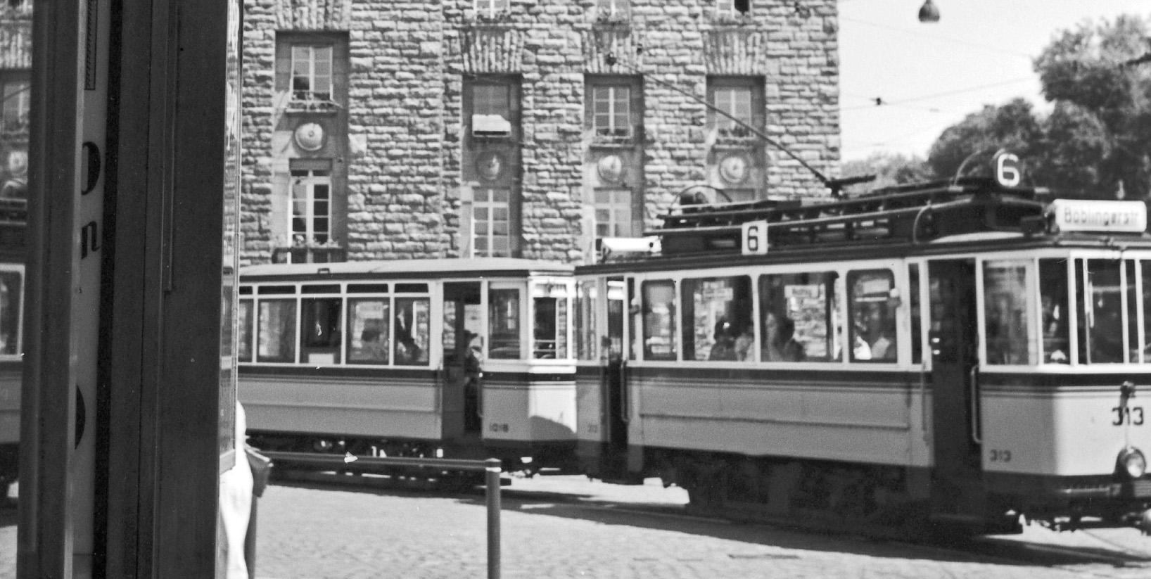 Tram line No. 2 reflecting main Station, Stuttgart Germany 1935, Printed Later - Photograph by Karl Heinrich Lämmel