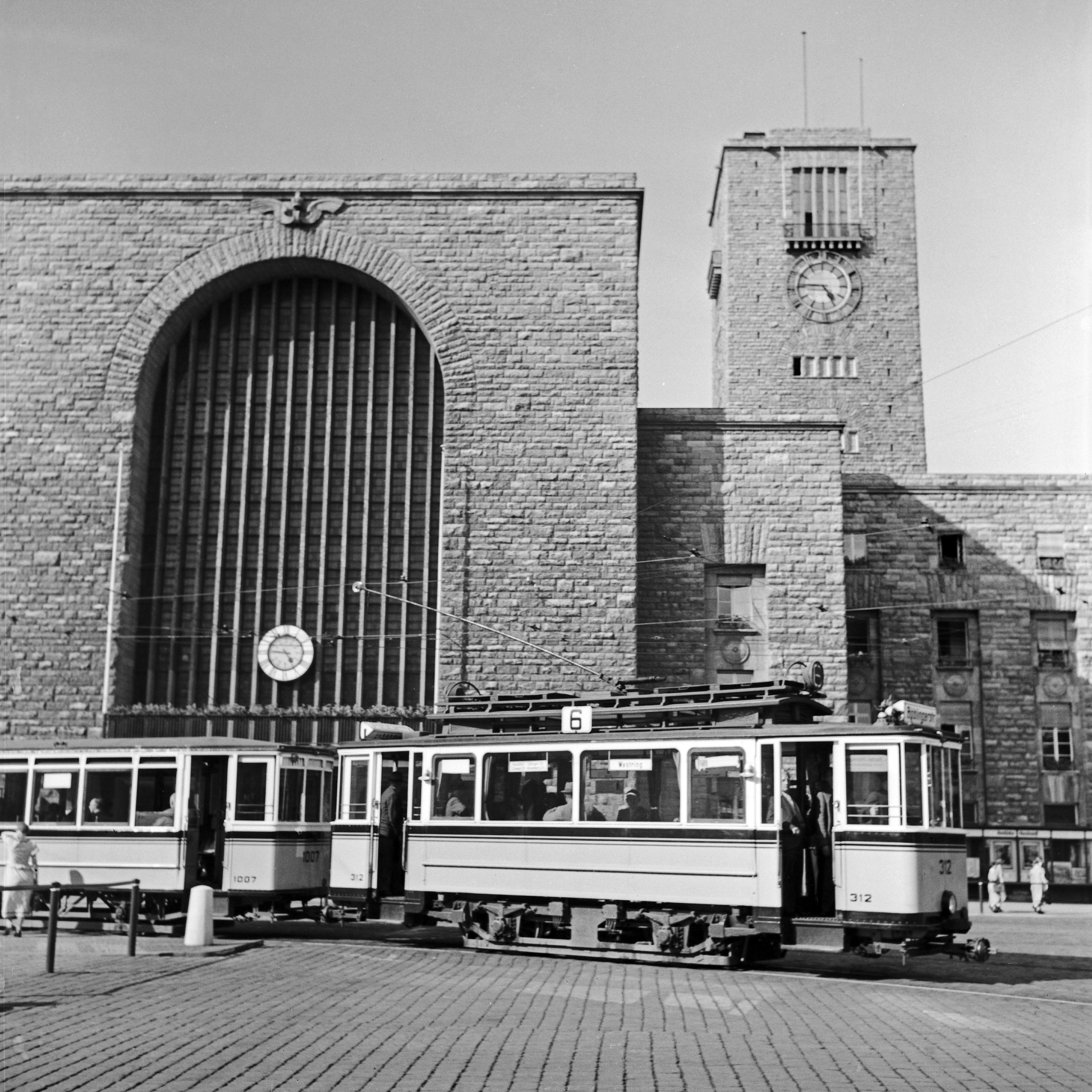 Karl Heinrich Lämmel Black and White Photograph - Tram line no. 6 in front of main station, Stuttgart Germany 1935, Printed Later