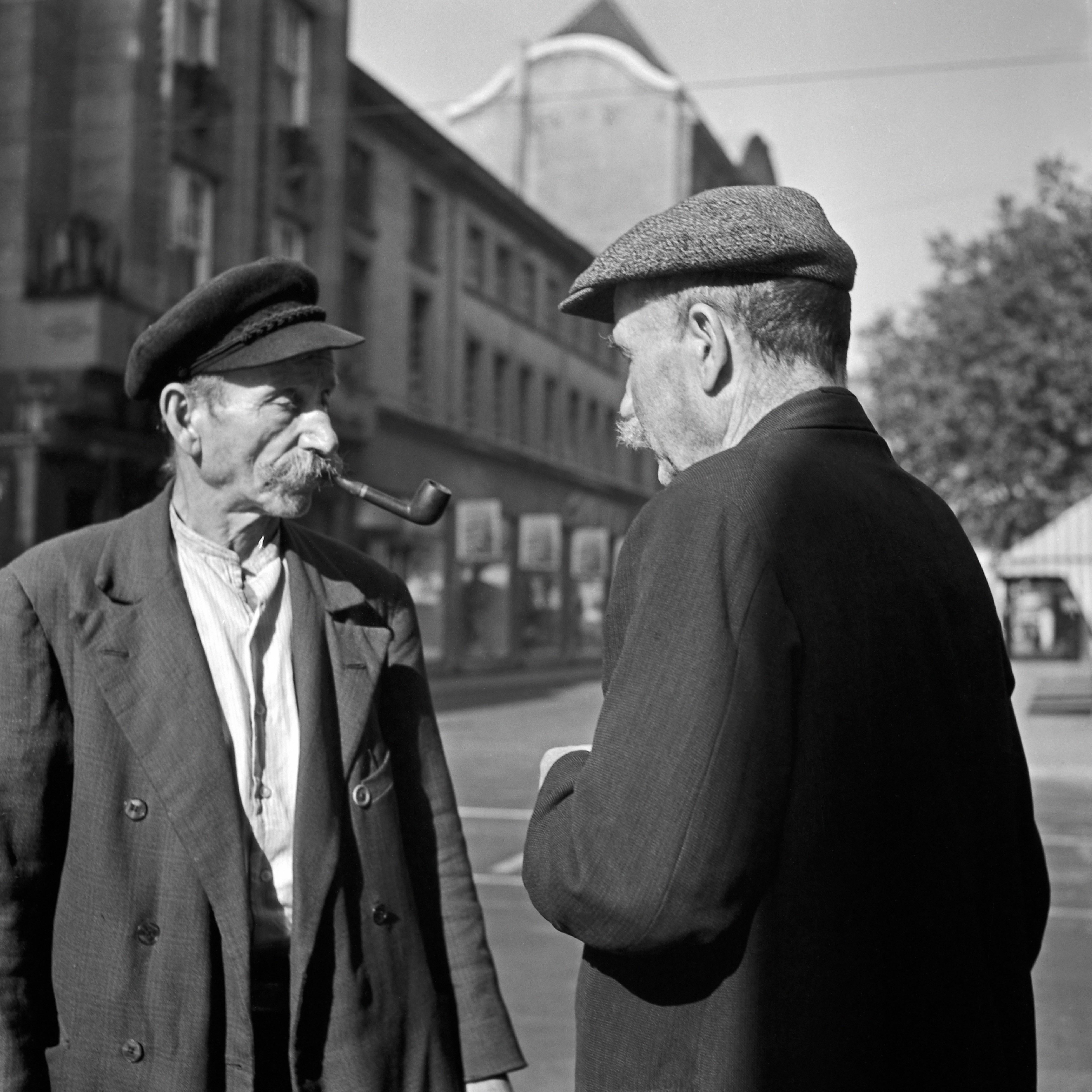 Karl Heinrich Lämmel Black and White Photograph - Two elder men having a chat at Duesseldorf, Germany 1937 Printed Later 