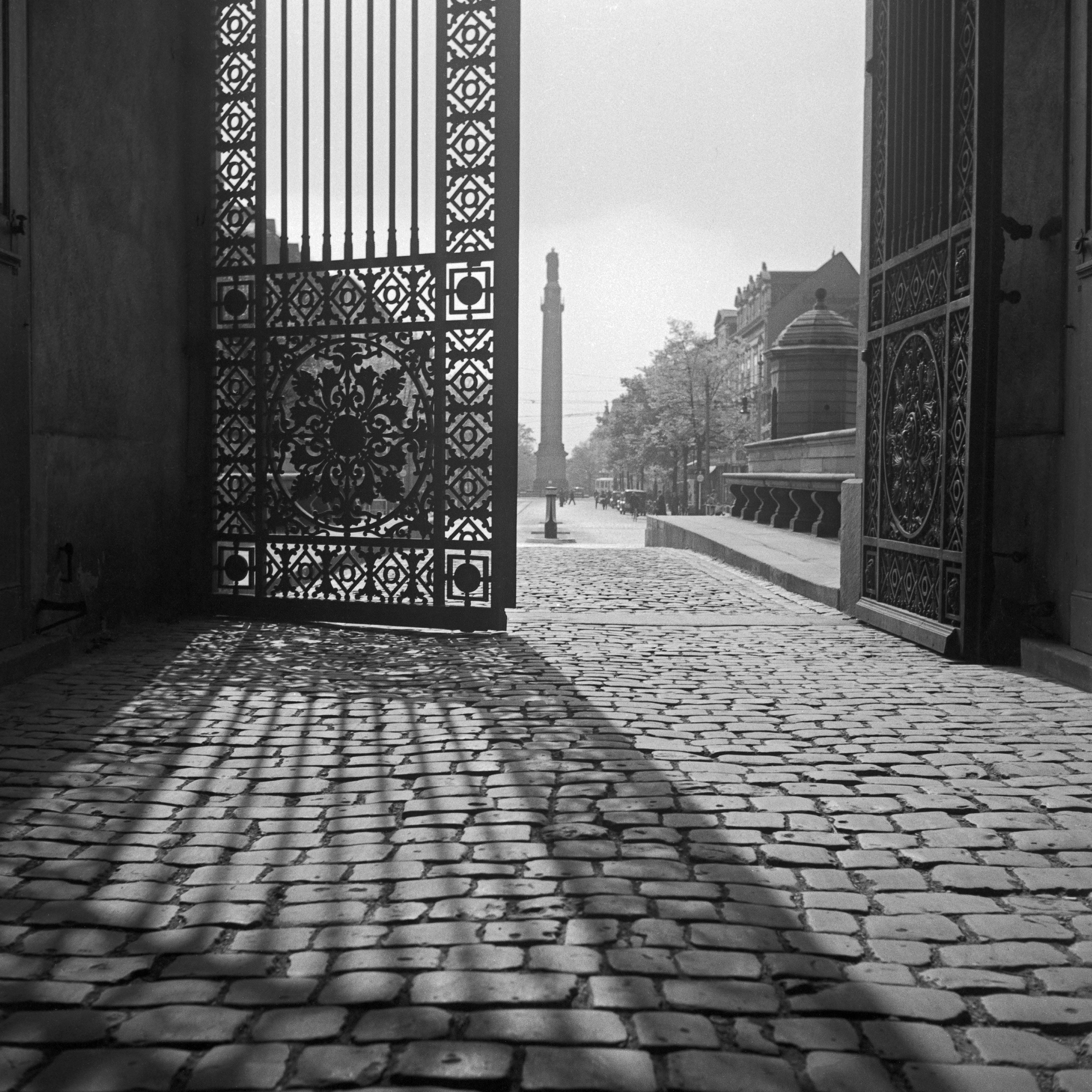 Karl Heinrich Lämmel Black and White Photograph - View from iron gate Darmstadt Castle to city life, Germany 1938 Printed Later