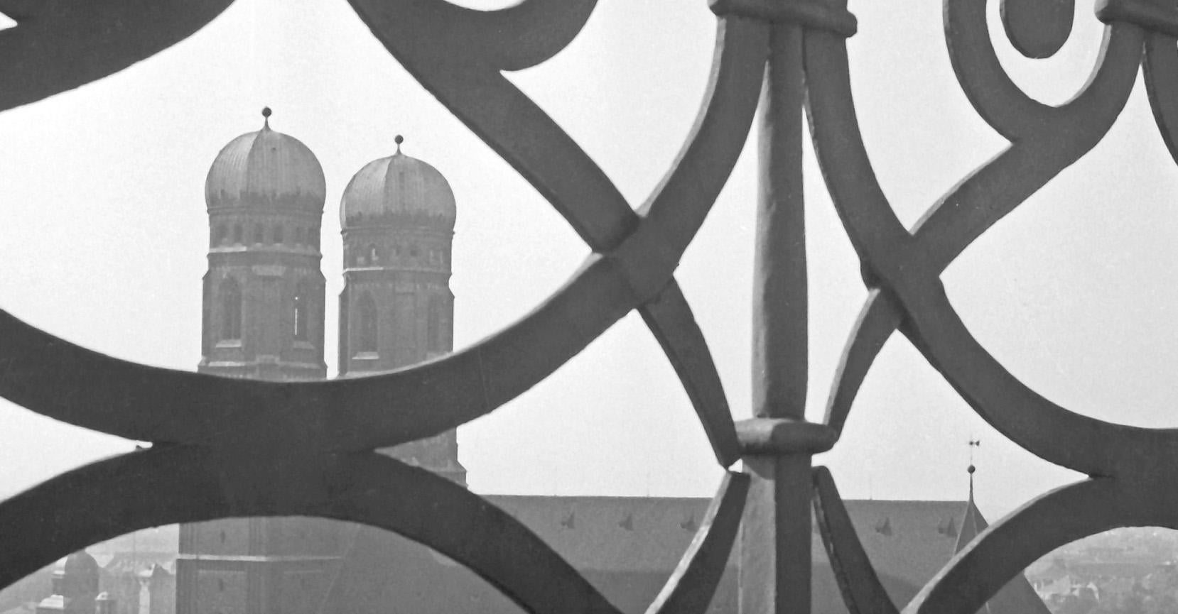 View to Munich Frauenkirche church with railing, Germany 1938, Printed Later - Photograph by Karl Heinrich Lämmel