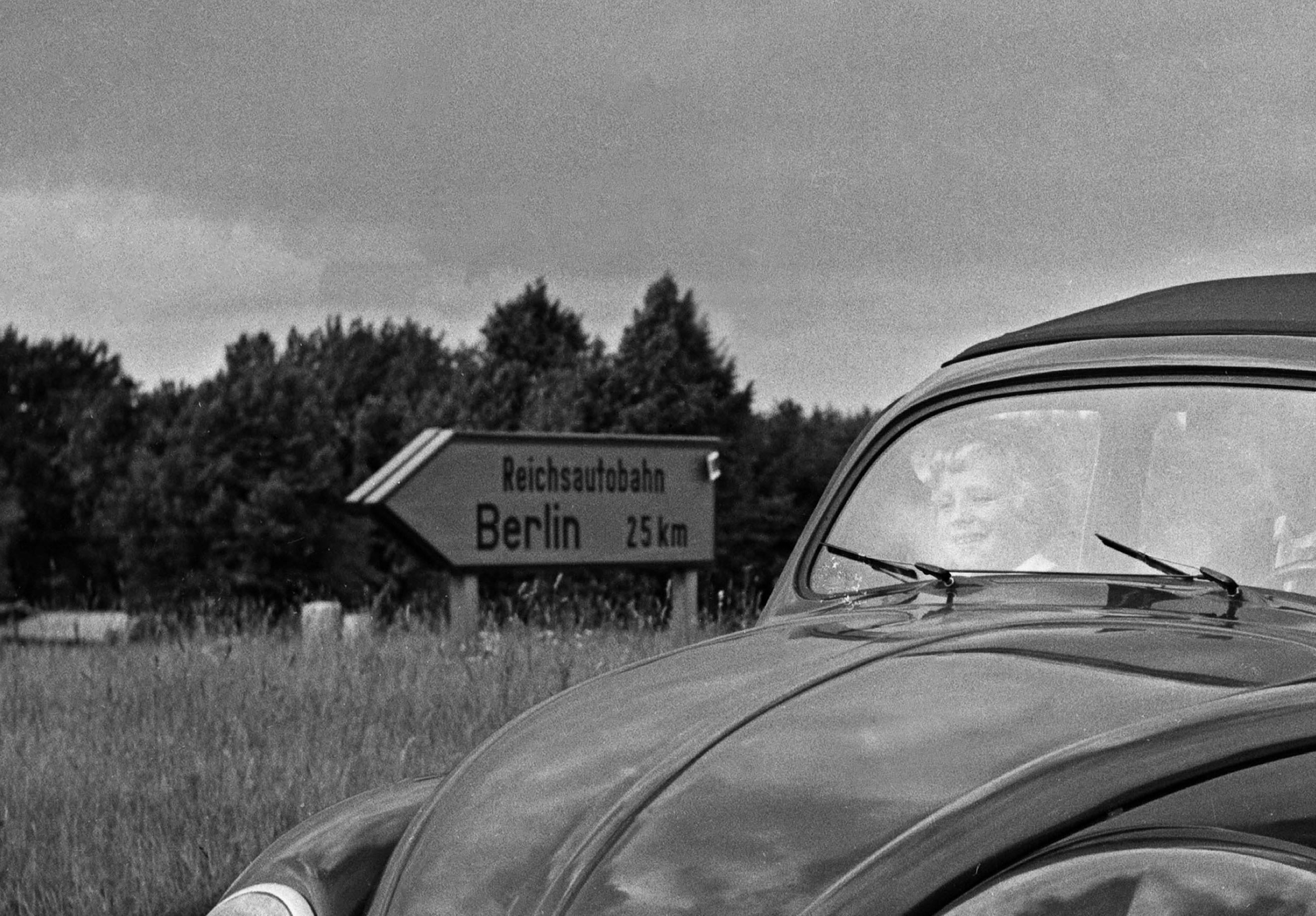 Volkswagen beetle parking on the streets, Germany 1939 Printed Later  - Photograph by Karl Heinrich Lämmel