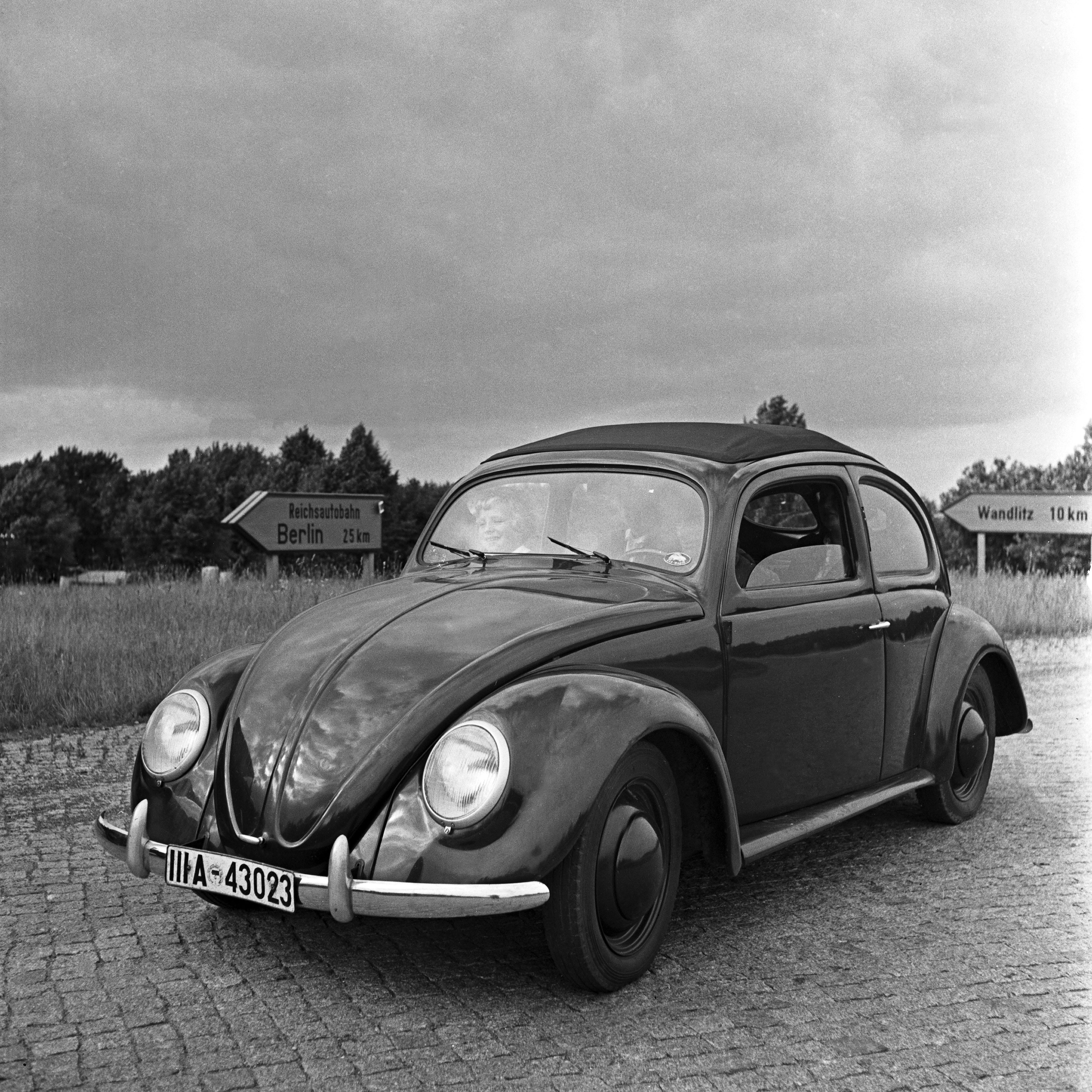 Karl Heinrich Lämmel Black and White Photograph - Volkswagen beetle parking on the streets, Germany 1939 Printed Later 