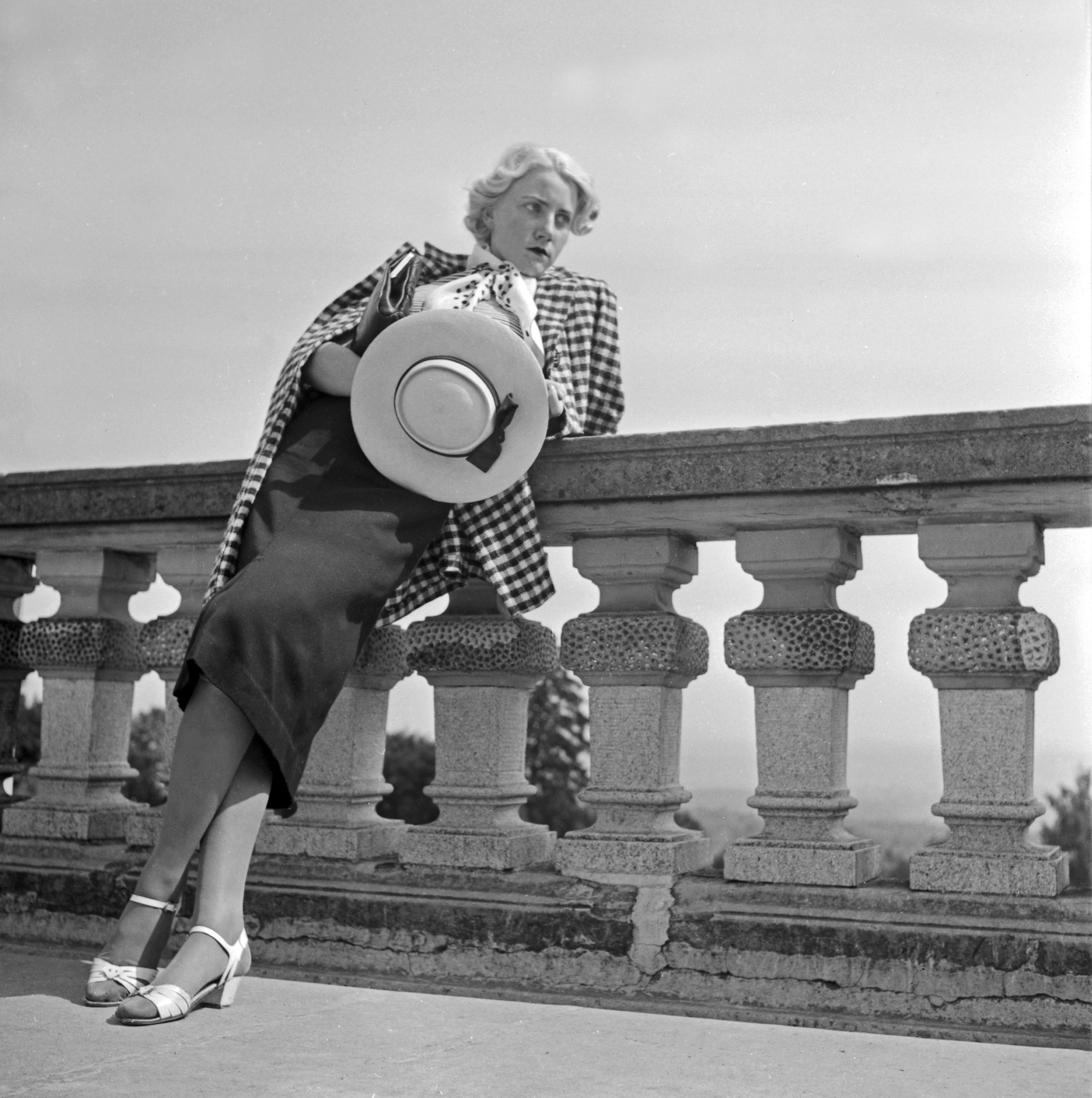 Karl Heinrich Lämmel Black and White Photograph - Woman leaning on balcony Solitude castle, Stuttgart Germany 1935, Printed Later