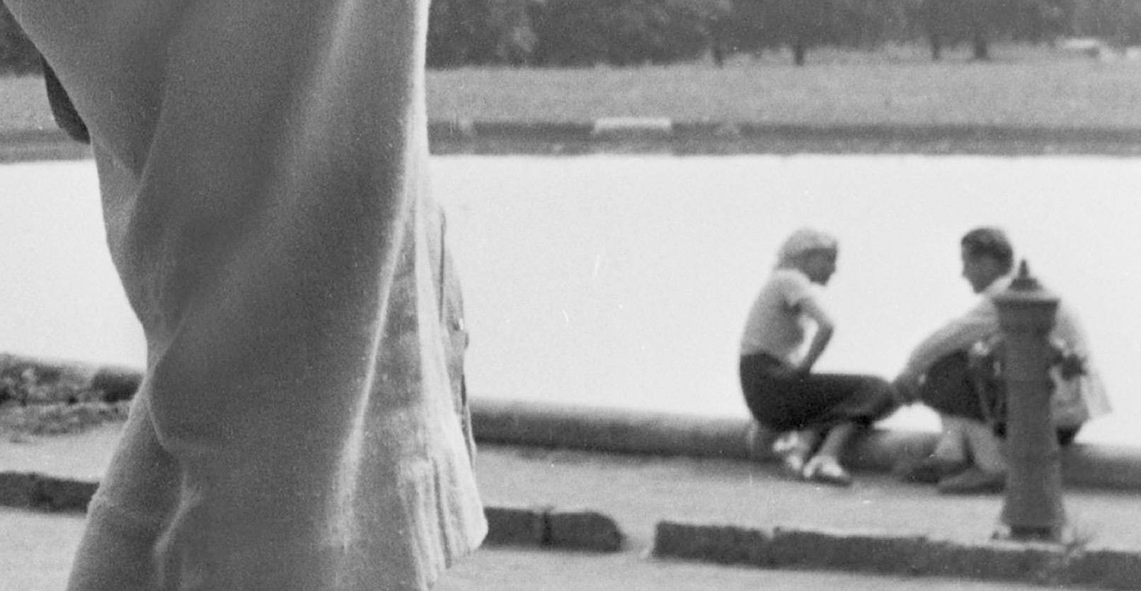 Woman leaning on column Cannstatt, Stuttgart Germany 1935, Printed Later - Photograph by Karl Heinrich Lämmel