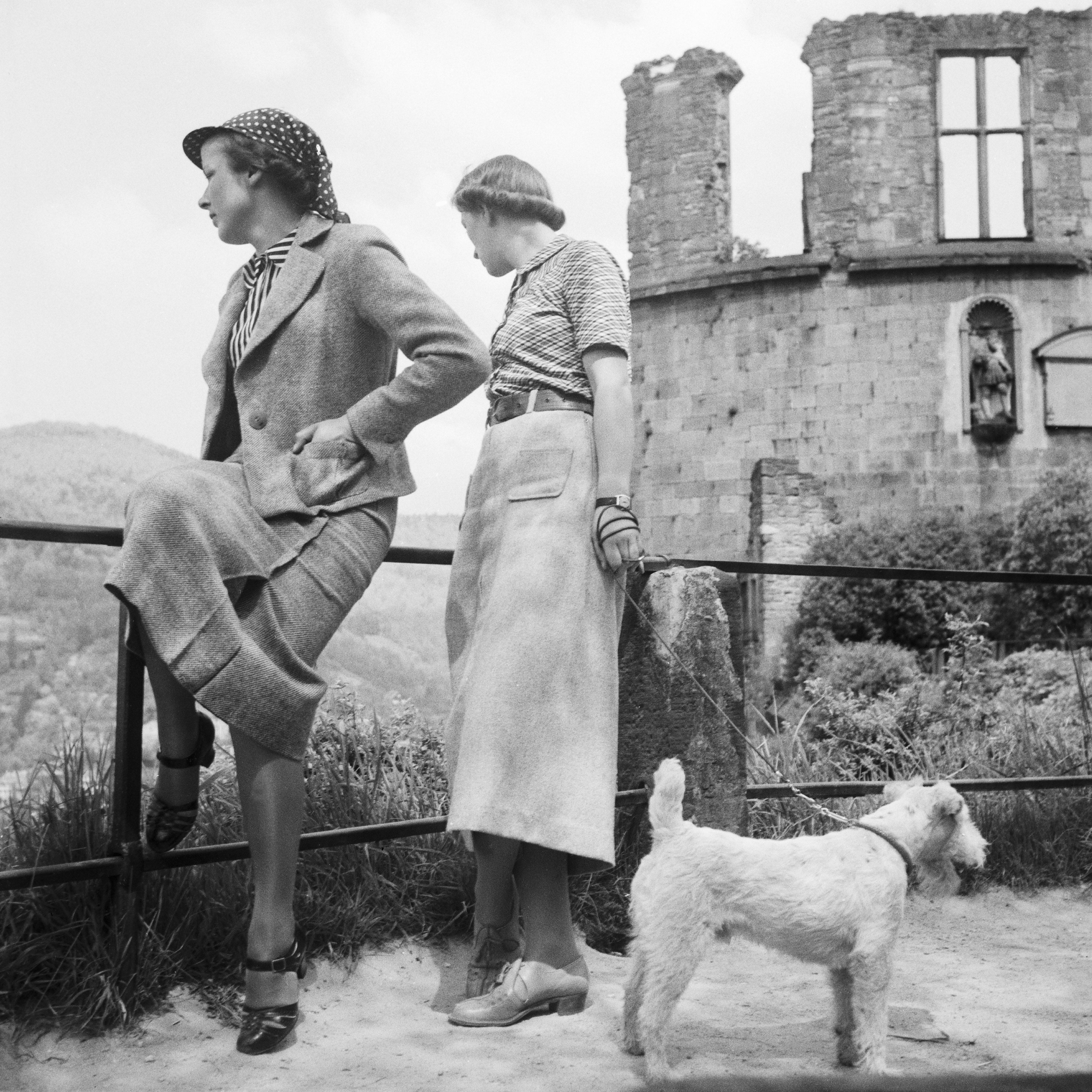 Karl Heinrich Lämmel Black and White Photograph - Women, Dog at Heidelberg castle on river neckar, Germany 1936, Printed Later 