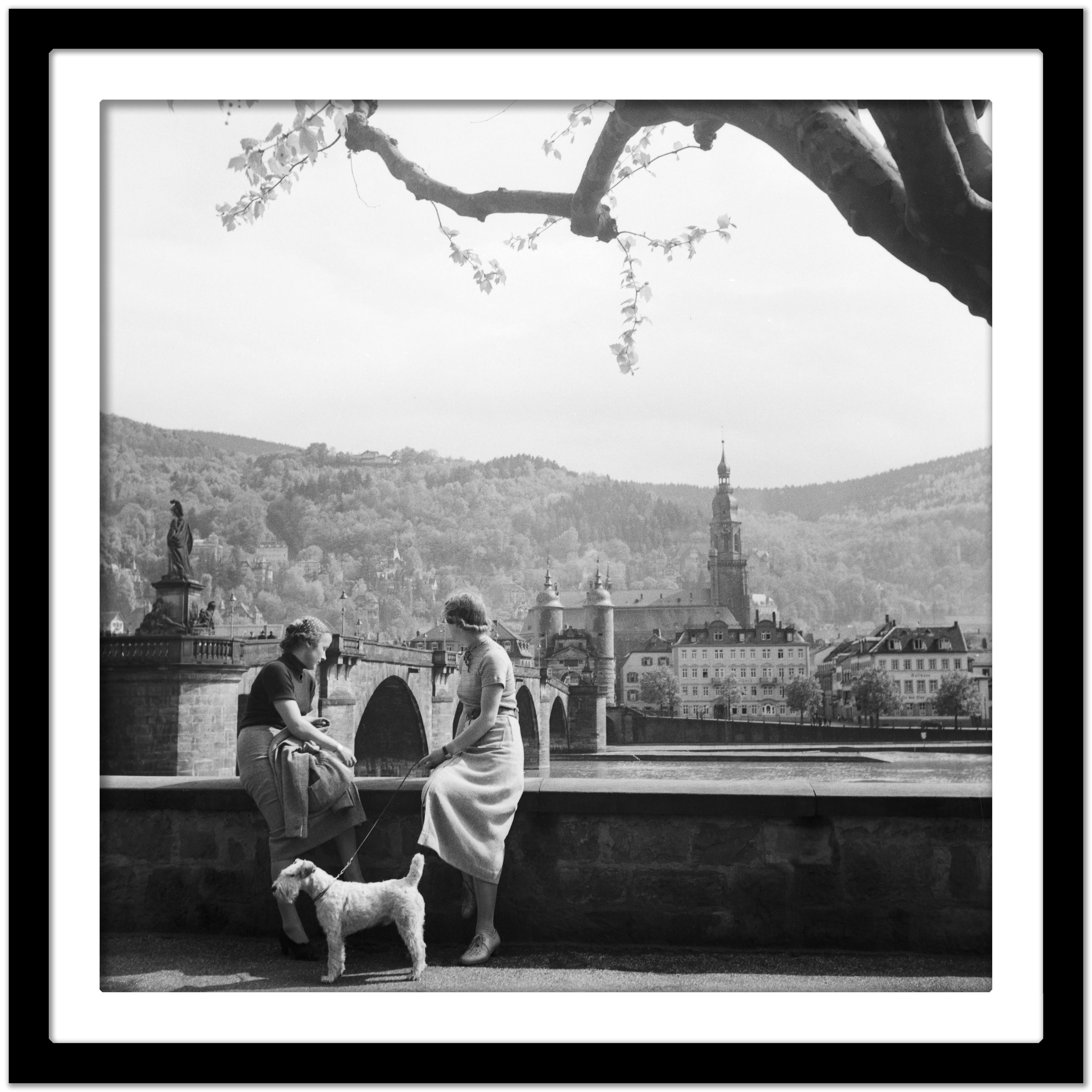 Women, dog at Neckar Heiliggeist church Heidelberg, Germany 1936, Printed Later  - Gray Black and White Photograph by Karl Heinrich Lämmel