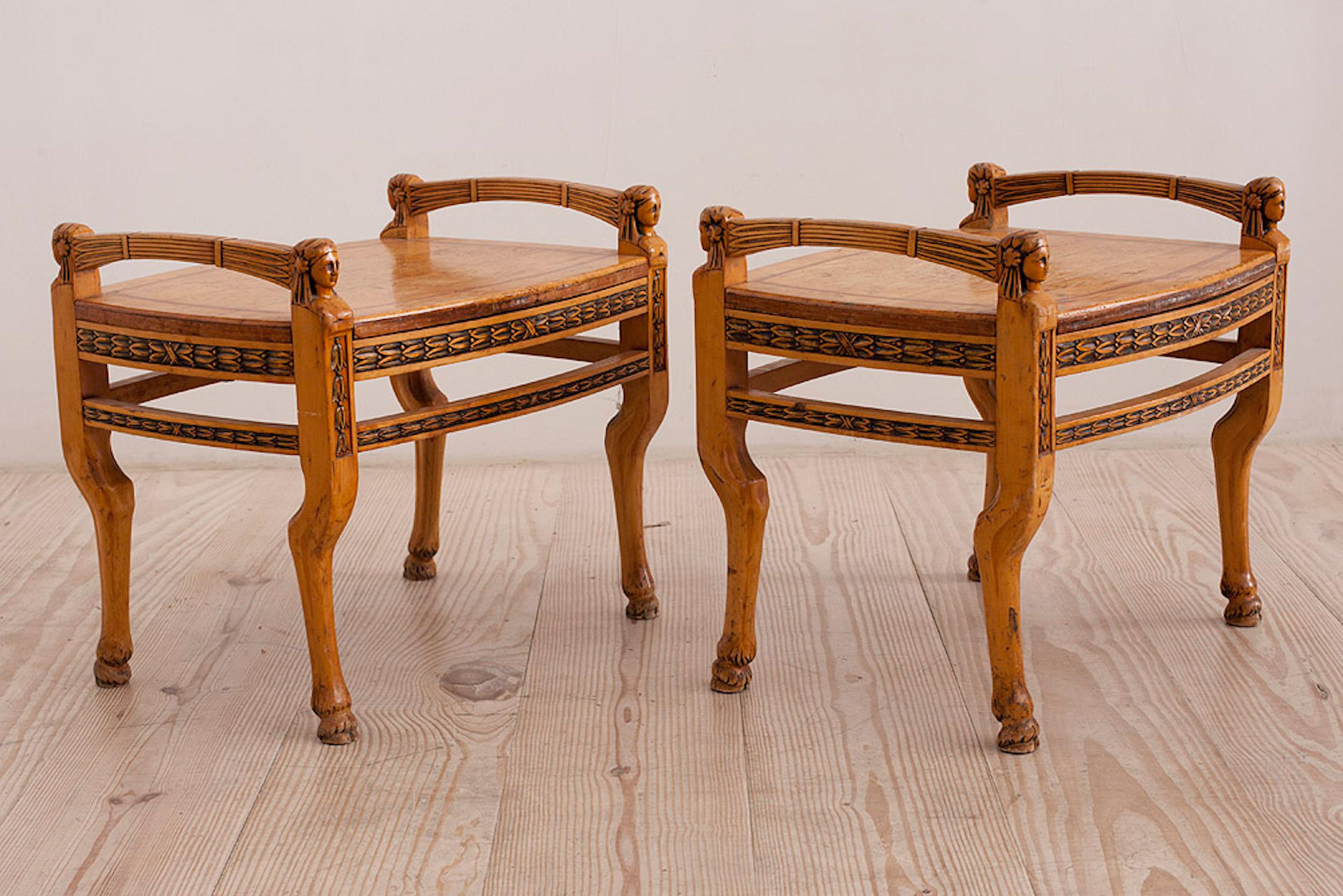 Swedish Karl Johan Taburettes set of three (3) stools with hand carved Egyptian heads, hoof feet with exceptional details of the hock, fetlock and animals fur and beautiful decorative wheat and bell flower carved details. Branded and dated: LÖFMARK