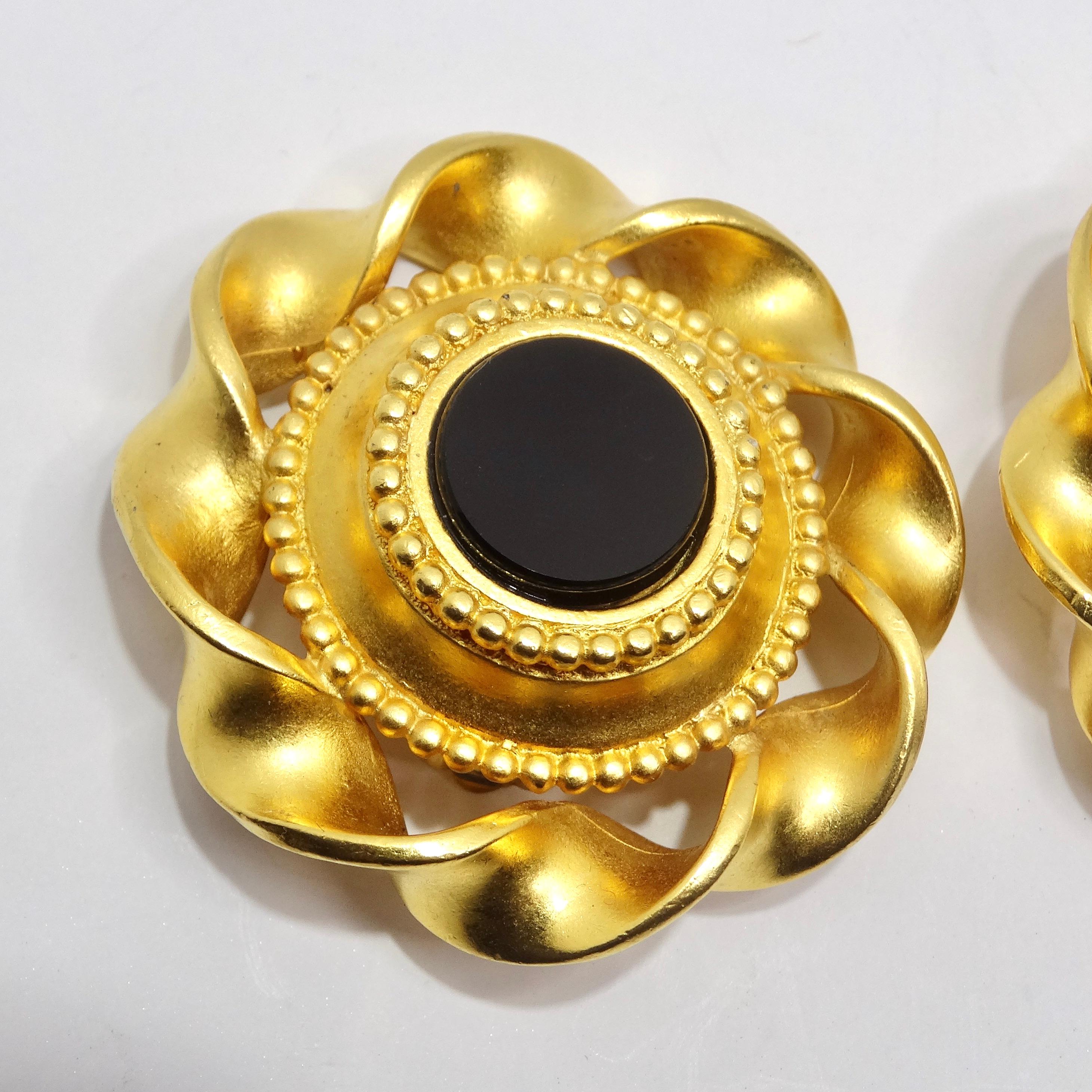 Do not miss out on a pair of statement earrings from the 1980s, these Karl Lagerfeld Gold Tone Black Stone Clip-On Earrings are the epitome of timeless chic. The shiny yellow gold-plated design exudes vintage elegance, capturing the glamour and
