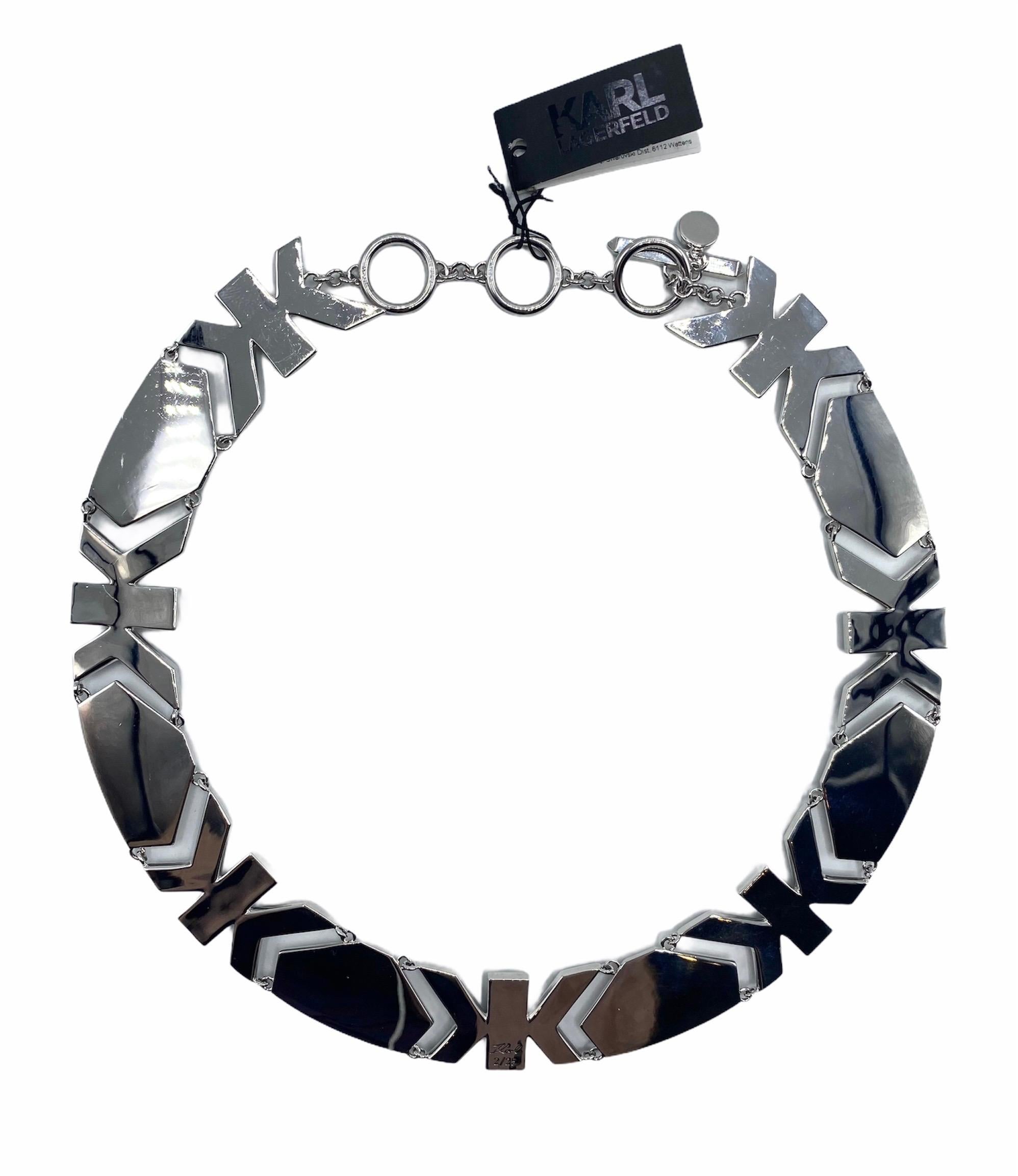 This collar-style necklace is part of an exclusive and limited edition jewelry collection inspired by Karl Lagerfeld's love of Art Deco style. In fact, There are 7 mirror image letter K links incorporated into the design of the necklace. The