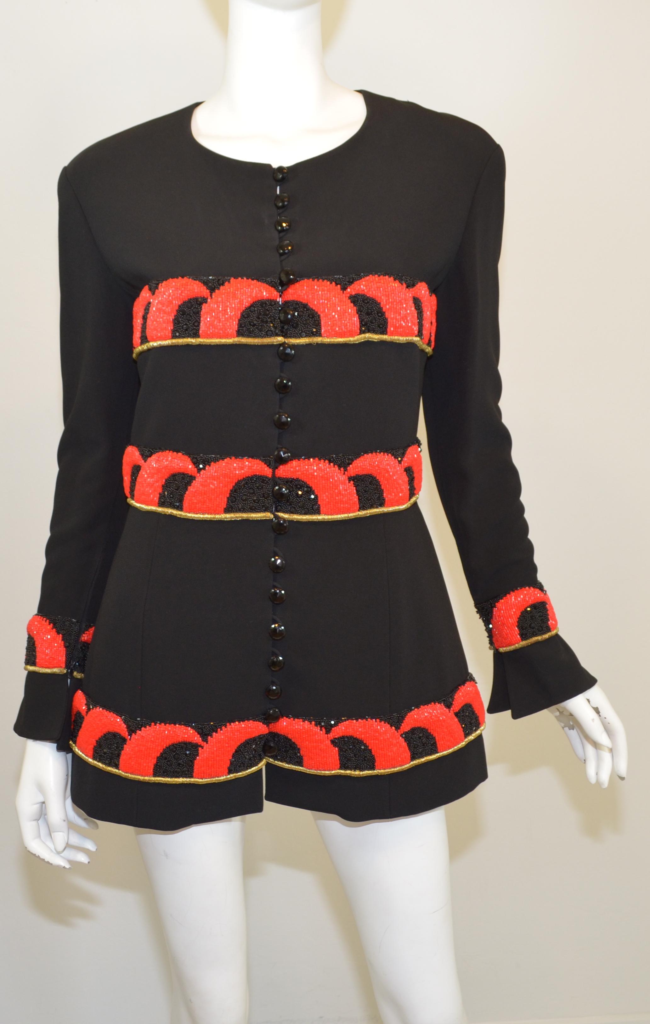 Karl Lagerfeld jacket featured in a black crepe-wool fabric with red, black, and gold bead embellishing, button fastenings, and zippers along the cuffs of the sleeves. Jacket is fully lined. Made in France.

Measurements:
bust 37'', sleeves 23'',